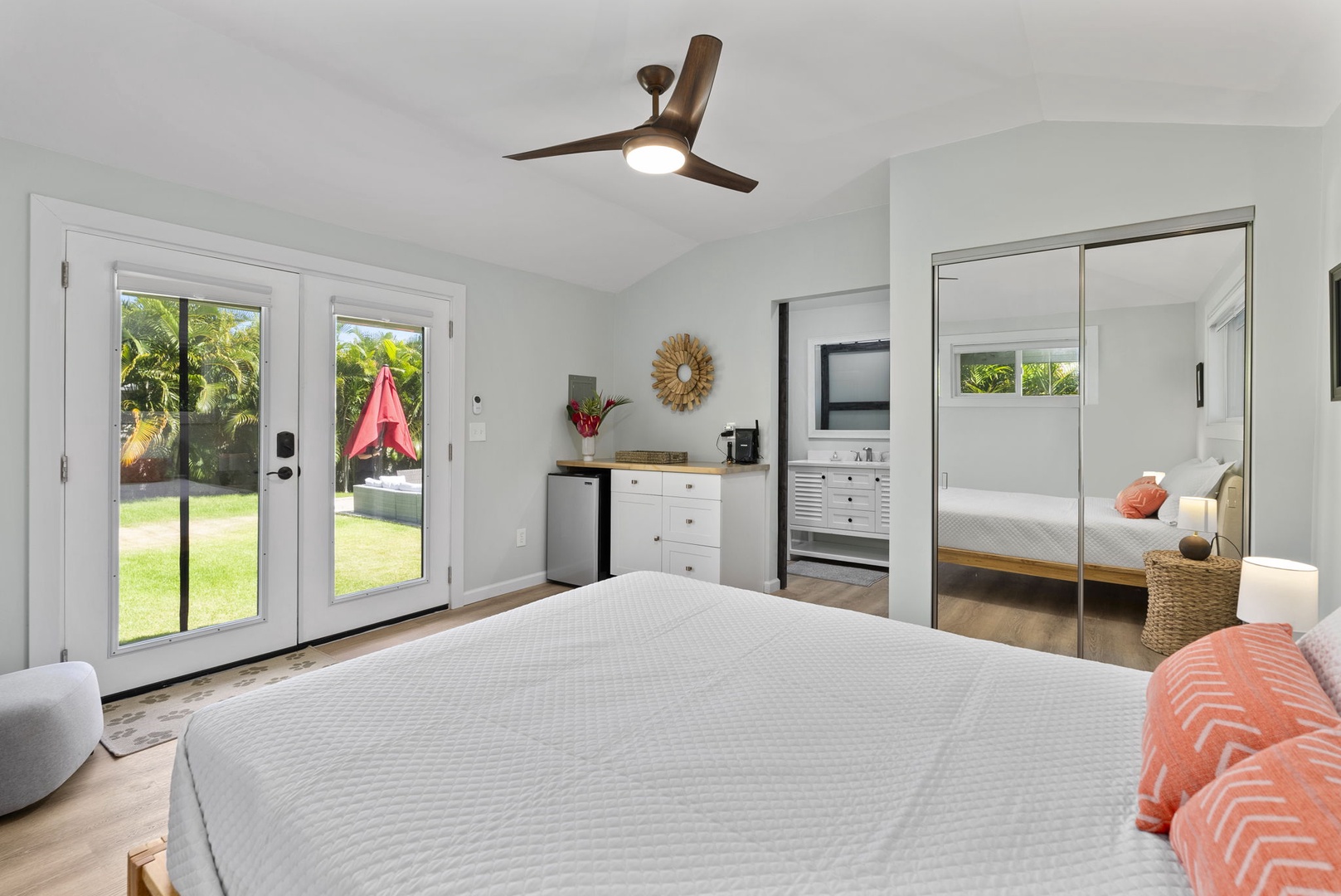 Kailua Vacation Rentals, Hale Alapi'i Lanikai Getaway - Experience serene relaxation in this bright primary suite, featuring direct access to the outdoors.