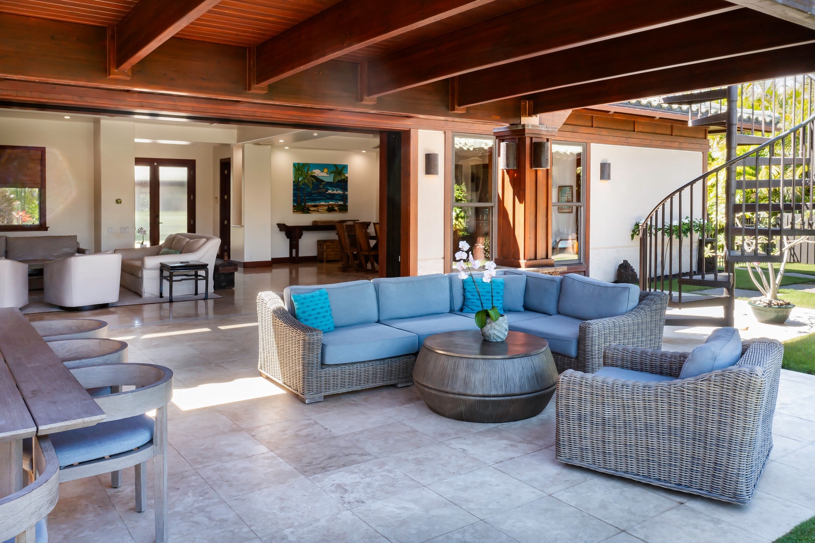 Kamuela Vacation Rentals, Beach Walker at Champion Ridge - Spacious covered lounge with plush seating and seamless indoor-outdoor flow.