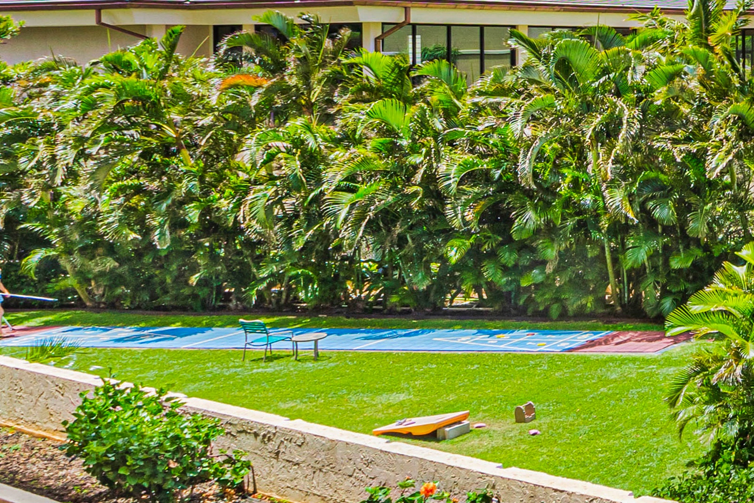 Lahaina Vacation Rentals, Royal Kahana 213 - The resort offers a variety of outdoor activities, including a lawn area for games like cornhole, providing fun for guests of all ages.