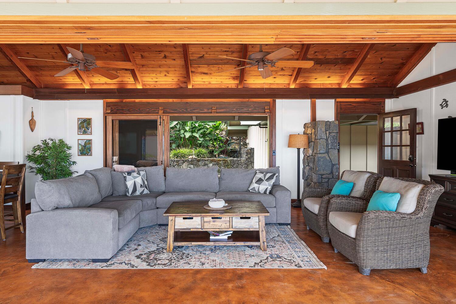 Kailua-Kona Vacation Rentals, Hale Joli - Spacious living room with a view, ideal for movie nights or morning coffee.