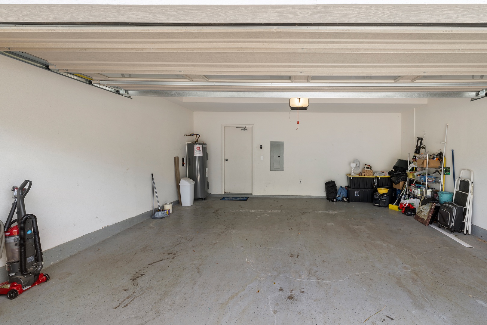 Spacious garage provides secure parking and convenient storage for your belongings during your stay.