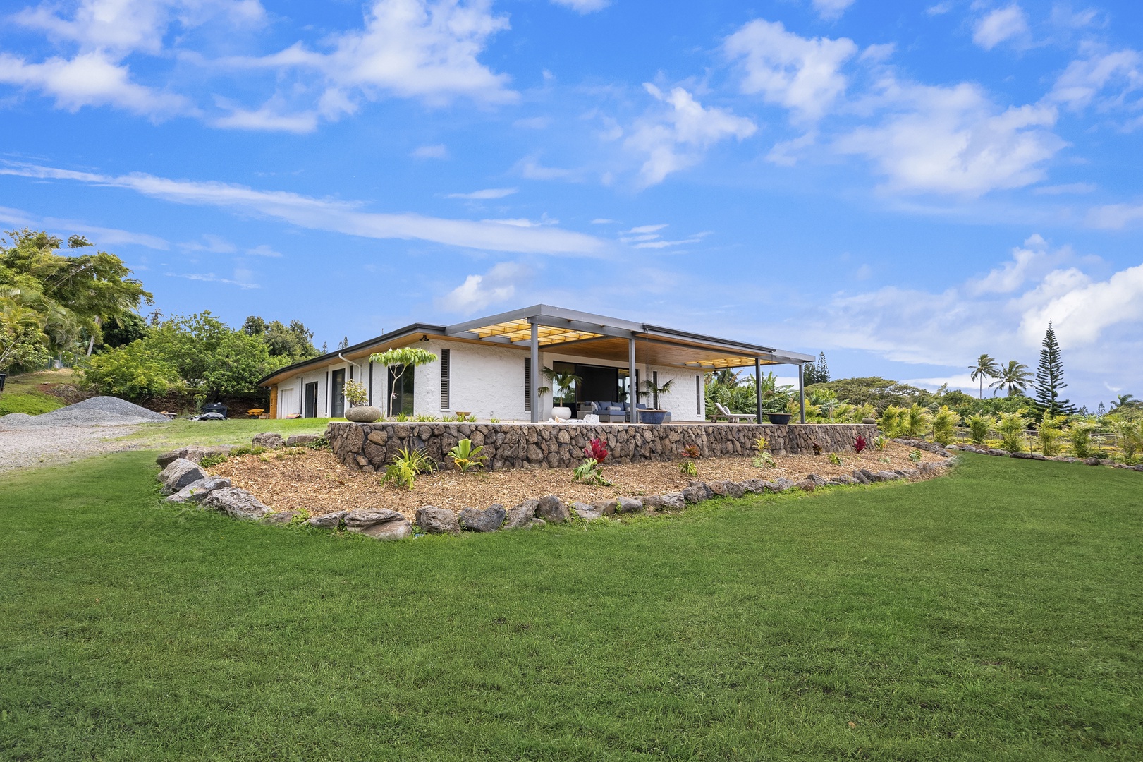 Haleiwa Vacation Rentals, Hale Mahina - Daytime view of the front of the house
