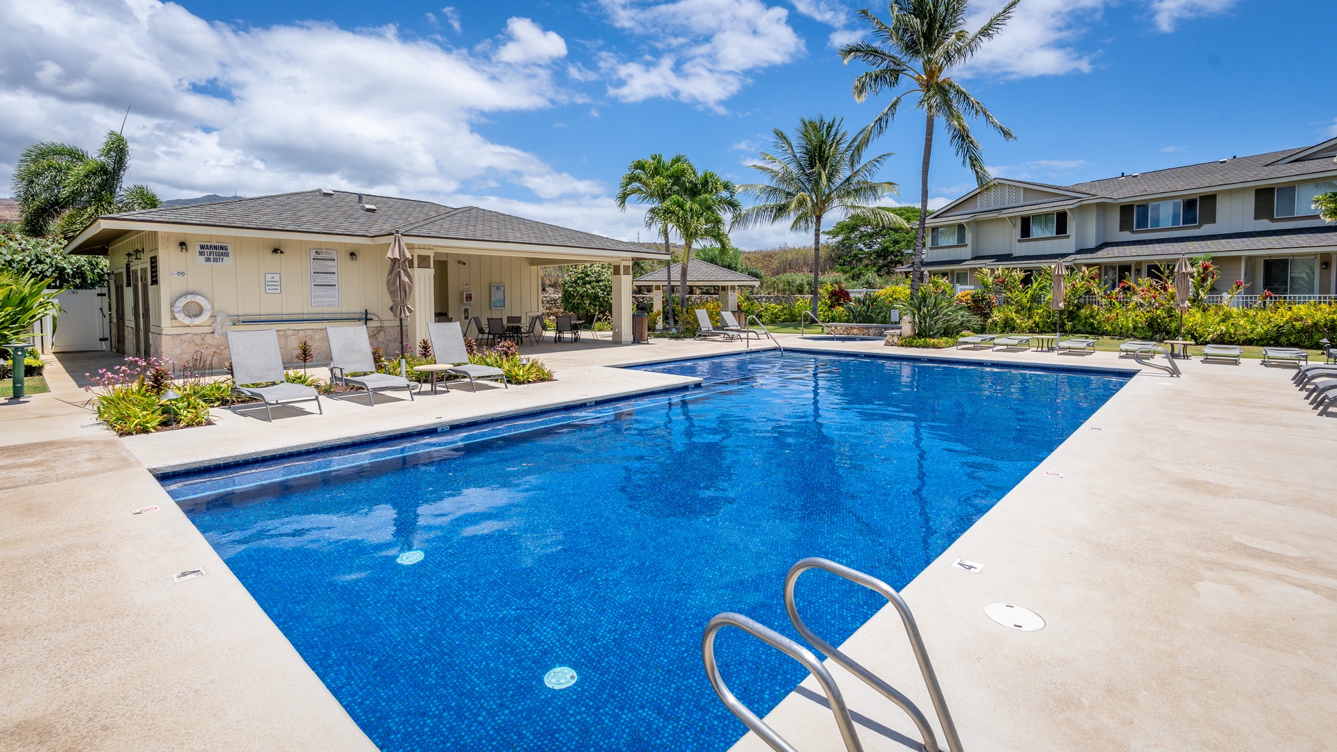 Kapolei Vacation Rentals, Hillside Villas 1496-2 - Go for a swim in the sparkling waters and rest in the lounge chairs by the pool.