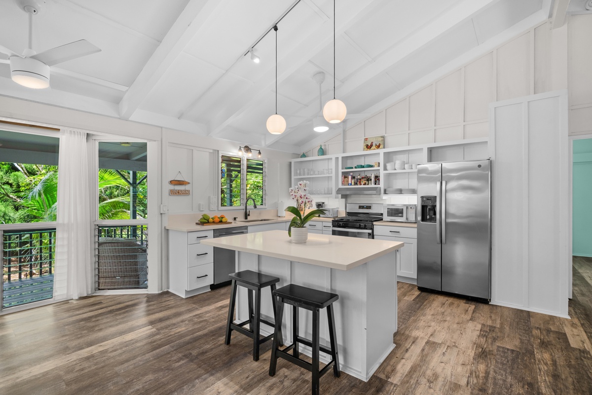 Hanalei Vacation Rentals, Hale Kanani (Kaua'i) TVNC 1342 - Pull up a stool at the white island while dinner comes together under the pendants.