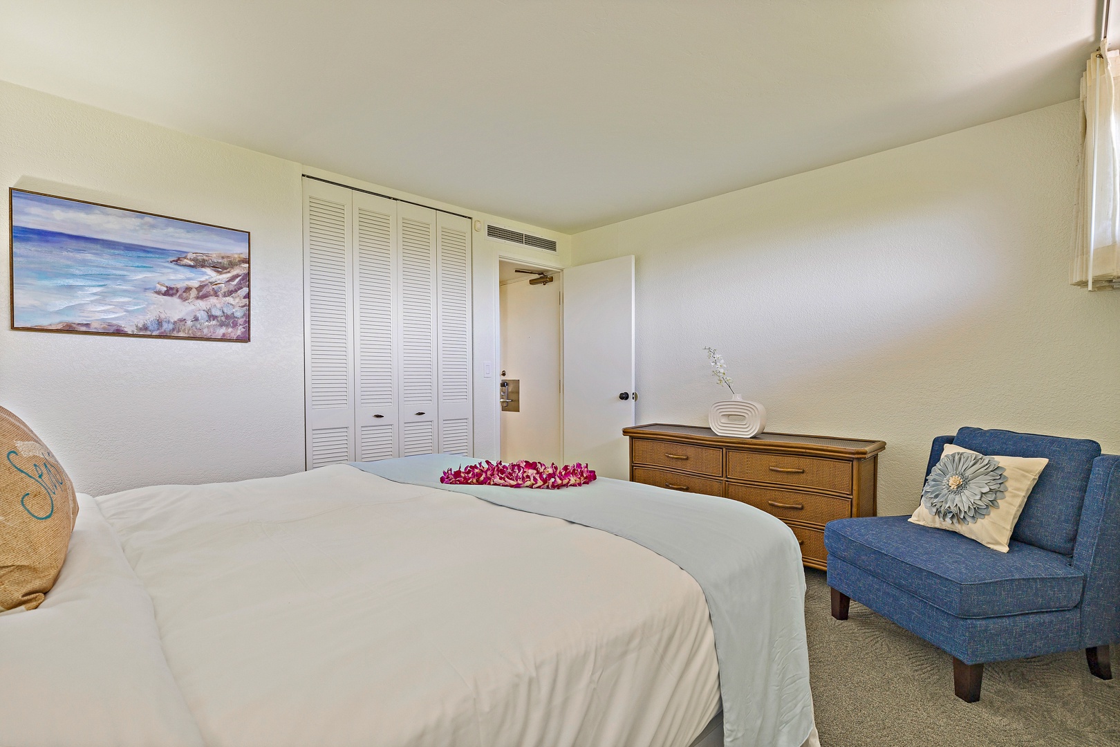 Lahaina Vacation Rentals, Kaanapali Shores 544 - This spacious bedroom features ample storage and simple furnishings, creating a peaceful atmosphere where you can relax and enjoy your stay.