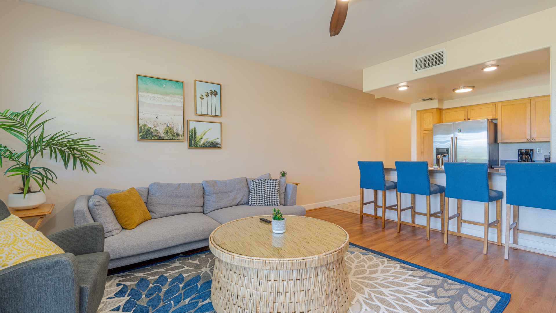 Kapolei Vacation Rentals, Hillside Villas 1496-2 - Sink into the plush seating in the living area surrounded by natural wood tones.
