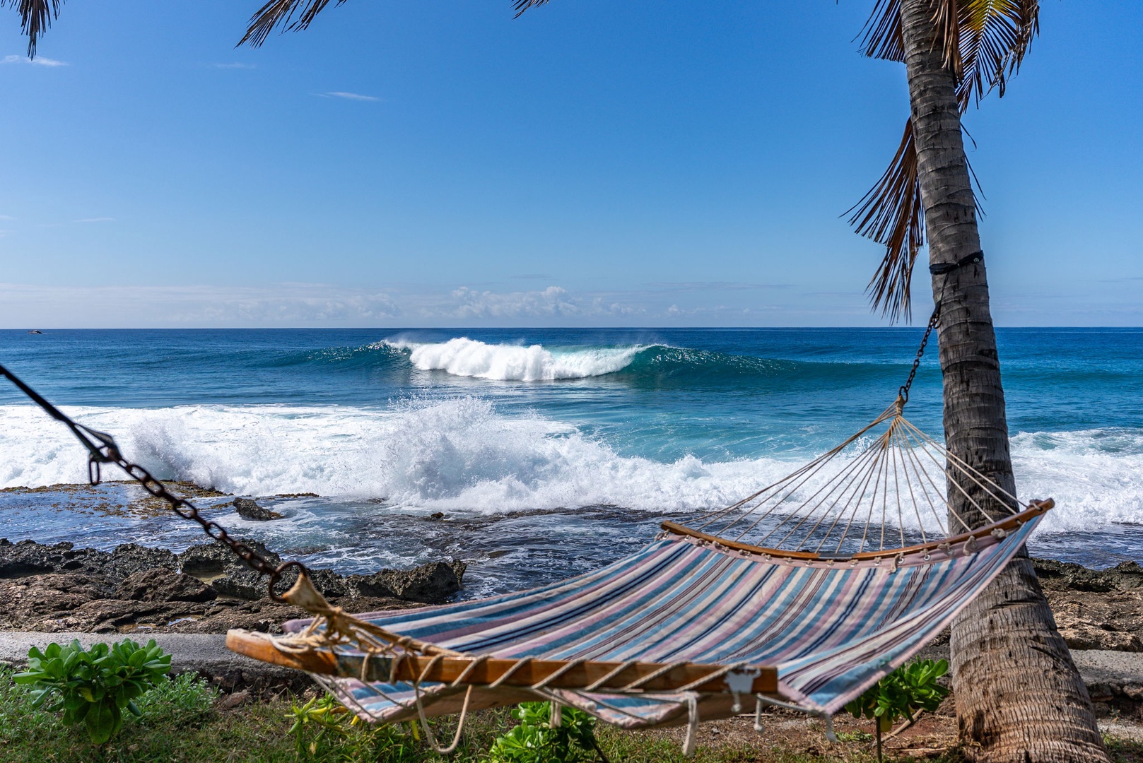 Waianae Vacation Rentals, Oceanfront Luxury Dream Estate - Enjoy the rhythmic sound of crashing waves while reclining beneath palms in a shaded hammock.