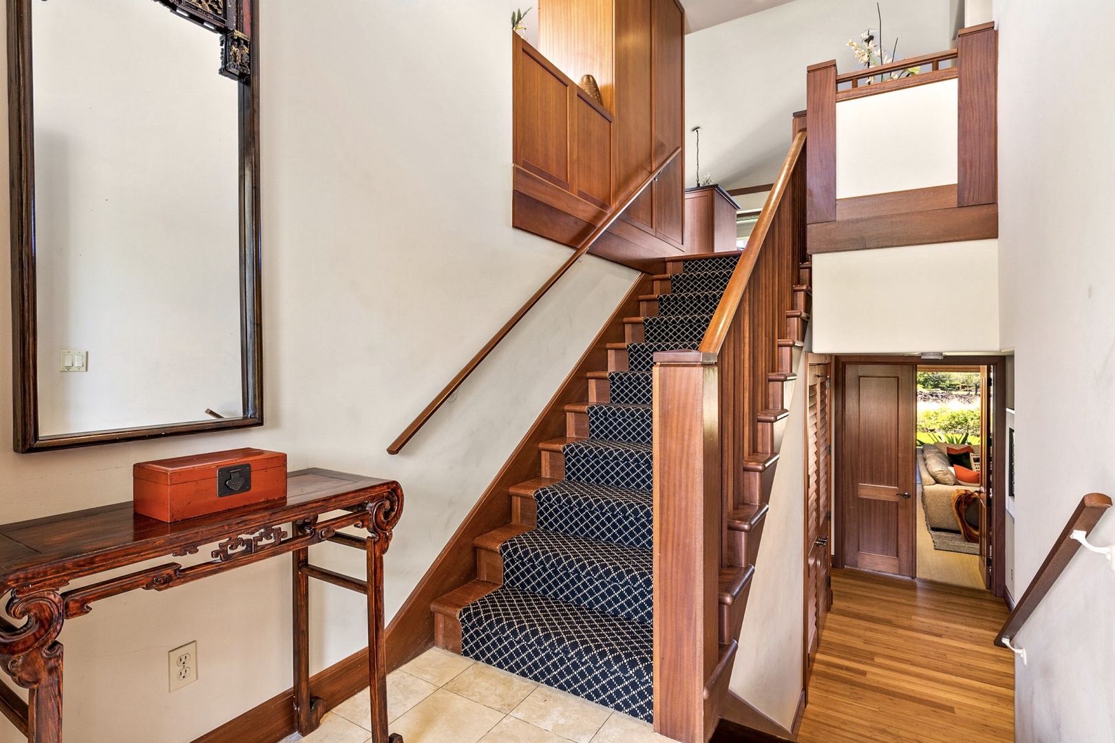 Kailua Kona Vacation Rentals, 3BD Ka'Ulu Villa (131C) at Hualalai Resort - View from entryway landing with half staircases to upper and lower levels.