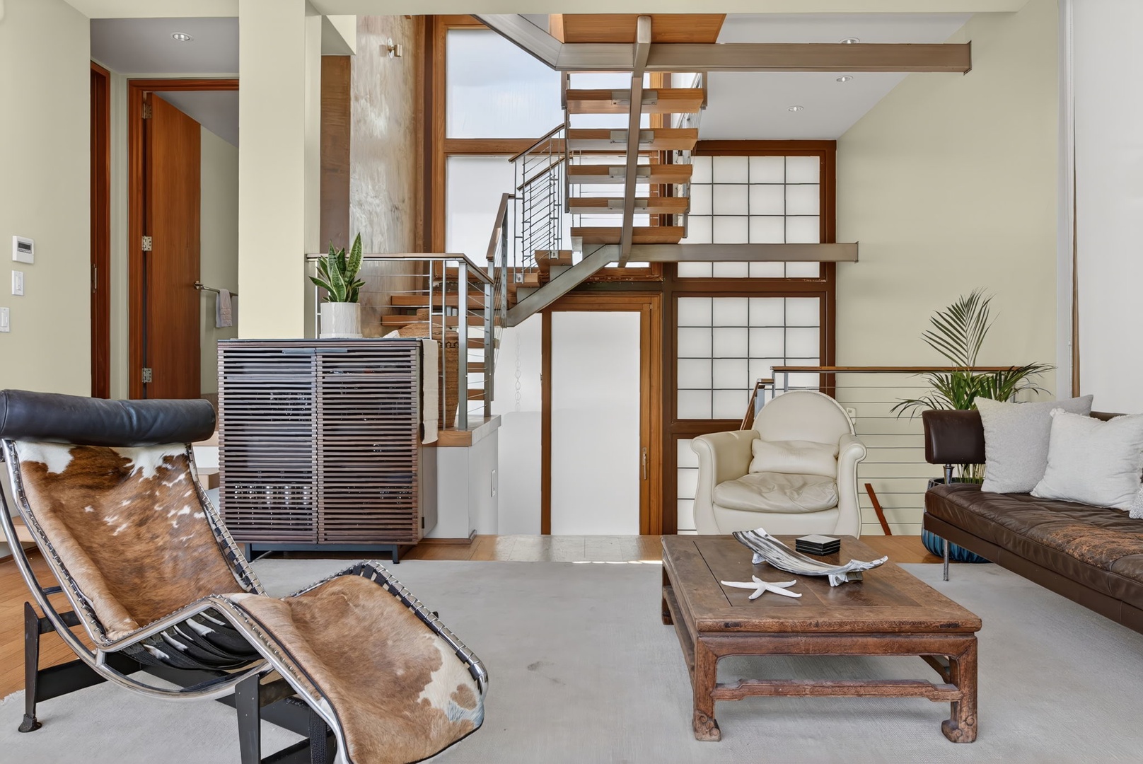 Haleiwa Vacation Rentals, HaleGator - Warm wood accents, soaring ceilings, and open sightlines create an inviting space inspired by the surrounding landscape.