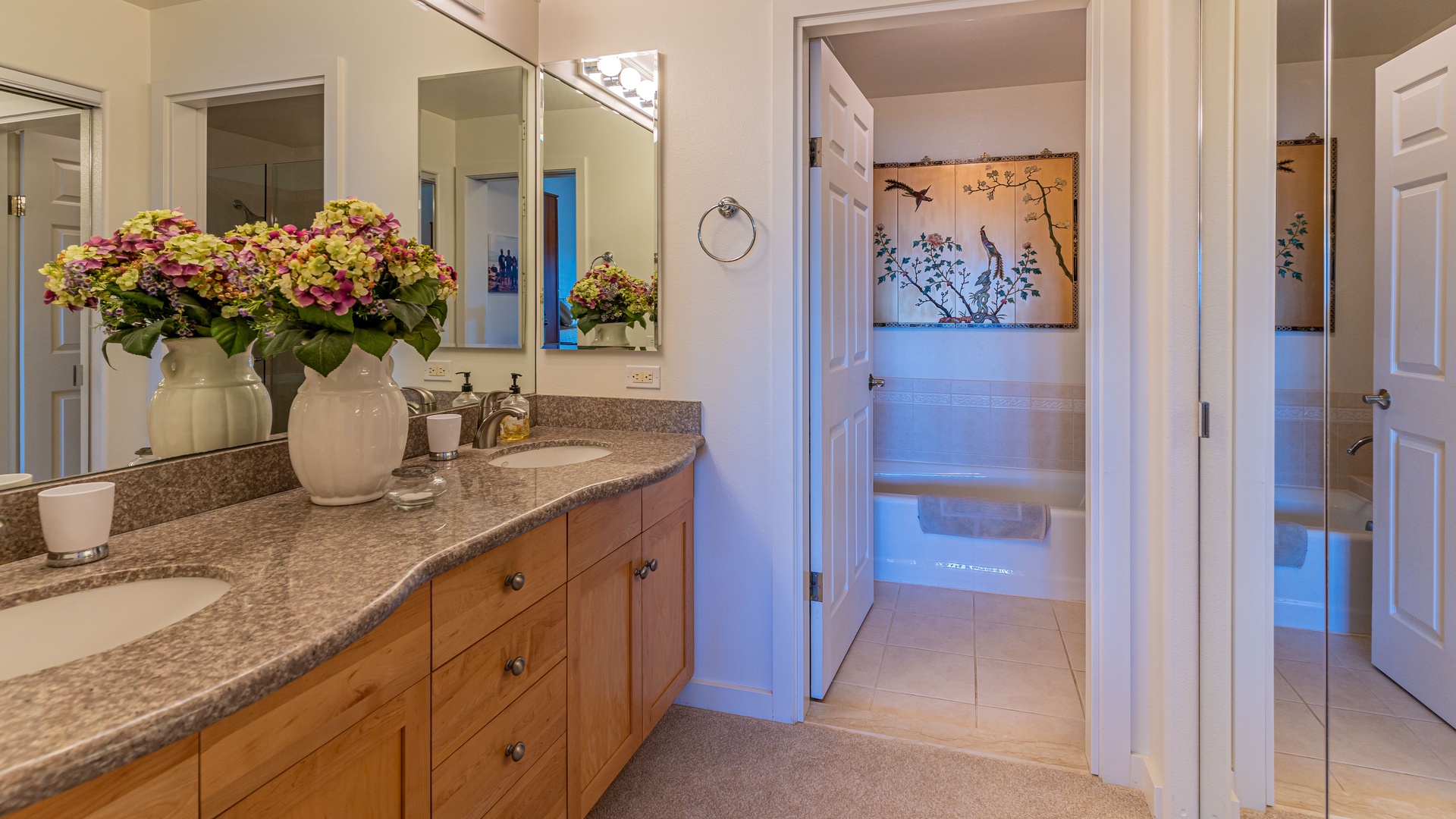 Kapolei Vacation Rentals, Kai Lani 16C - The primary guest bathroom is a tastefully decorated full bathroom.