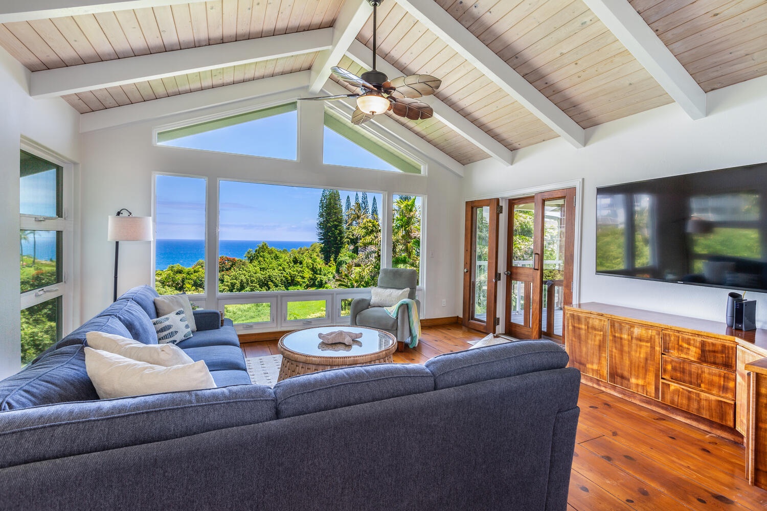 Princeville Vacation Rentals, Wai Lani - Our spacious living area is a sanctuary of light, offering a peaceful space to relax and rejuvenate.