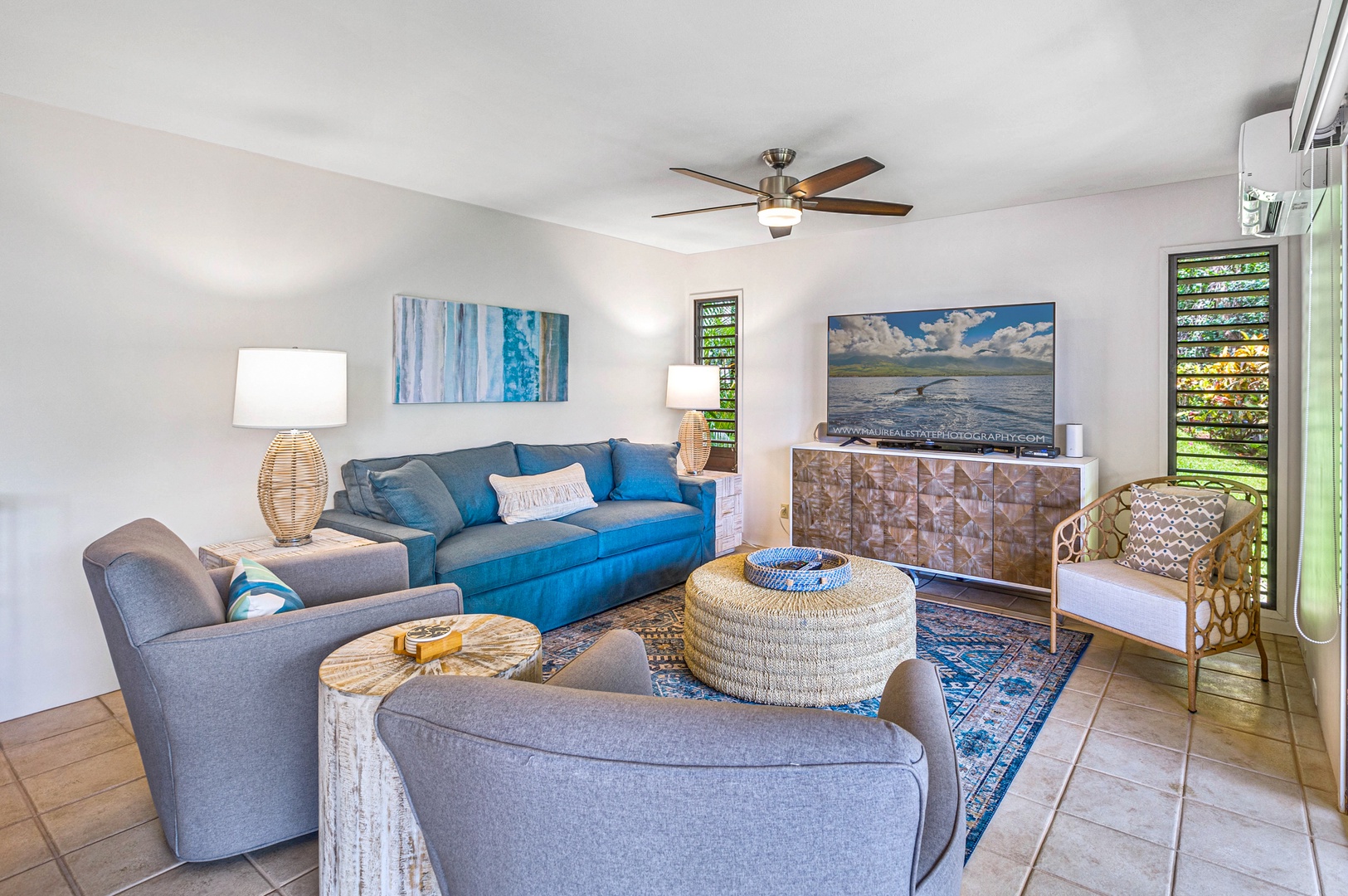 Kihei Vacation Rentals, Wailea Ekolu 1605 - The cozy living room features comfortable seating and a large TV, perfect for relaxing after a day of exploring.