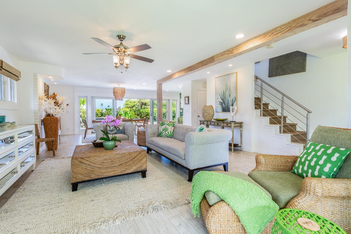 Princeville Vacation Rentals, Hokulani Villa - Spacious living area with comfortable seating and modern amenities, ideal for family gatherings and relaxation.