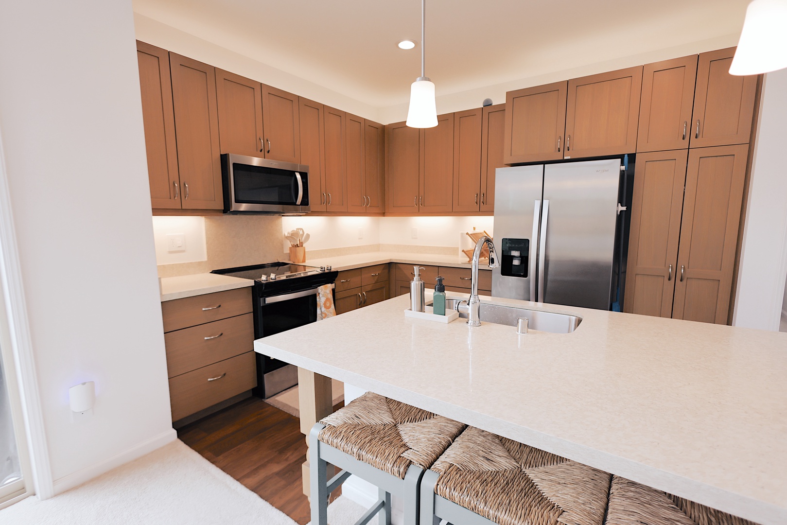 Makaha Valley Vacation Rentals, Makaha Vista Retreat** - Fully stocked kitchen with island seating—perfect for breakfast chats or pre-surf smoothies.
