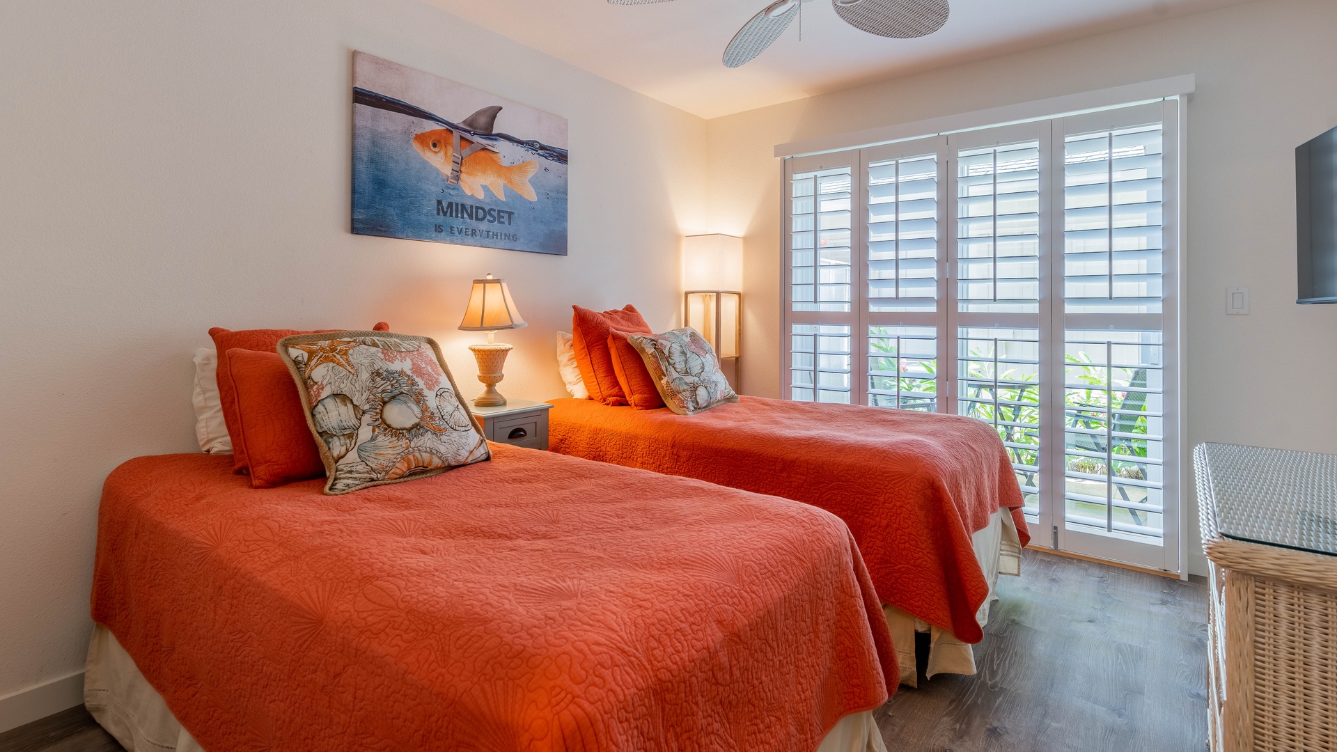Kapolei Vacation Rentals, Coconut Plantation 1208-2 - The second guest bedroom with two beds, a ceiling fan and scenery.