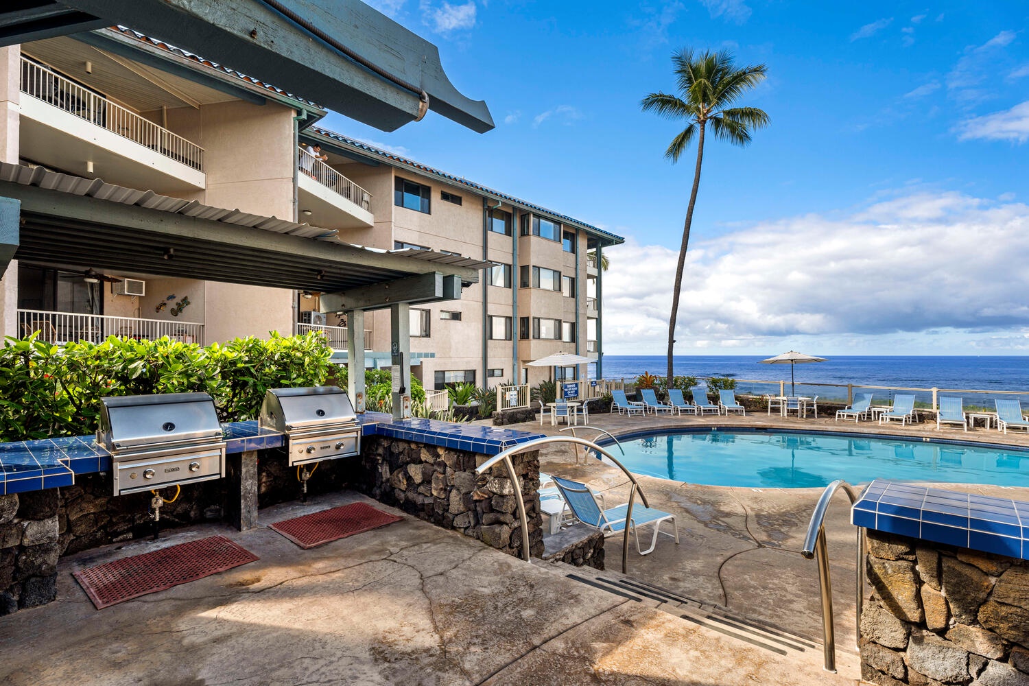 Kailua-Kona Vacation Rentals, Kona Reef B32 - Barbecue Facilities and Pavilion located adjacent to the Oceanfront Pool.