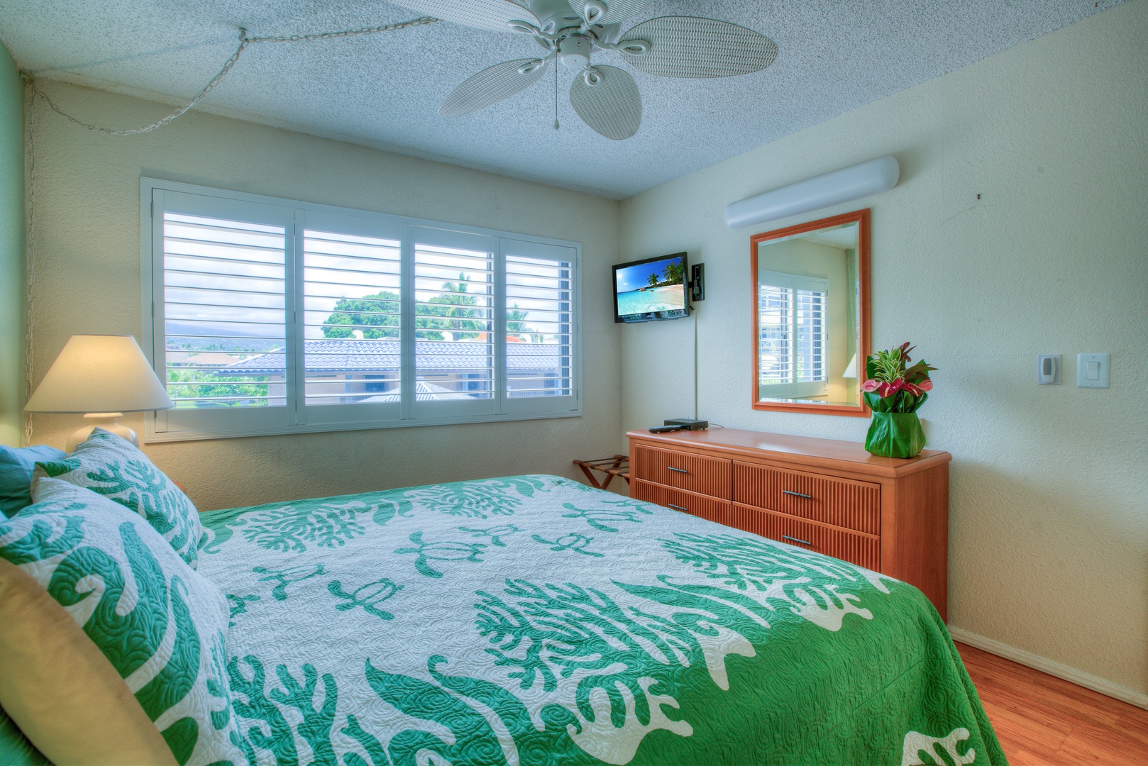 Kailua Kona Vacation Rentals, Kona Reef F11 - Bedroom has Views of Hualalai Mountain through Plantation Shutters.