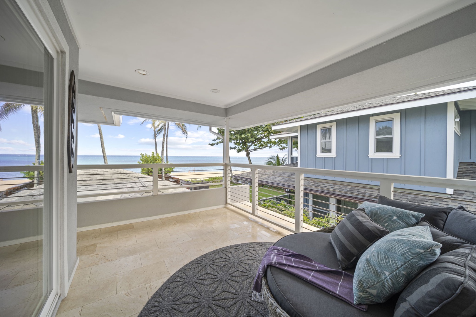 Haleiwa Vacation Rentals, Hale Nalu - Taking you Upstairs: Enjoy the gentle breezes from the beach on the upper level lanai