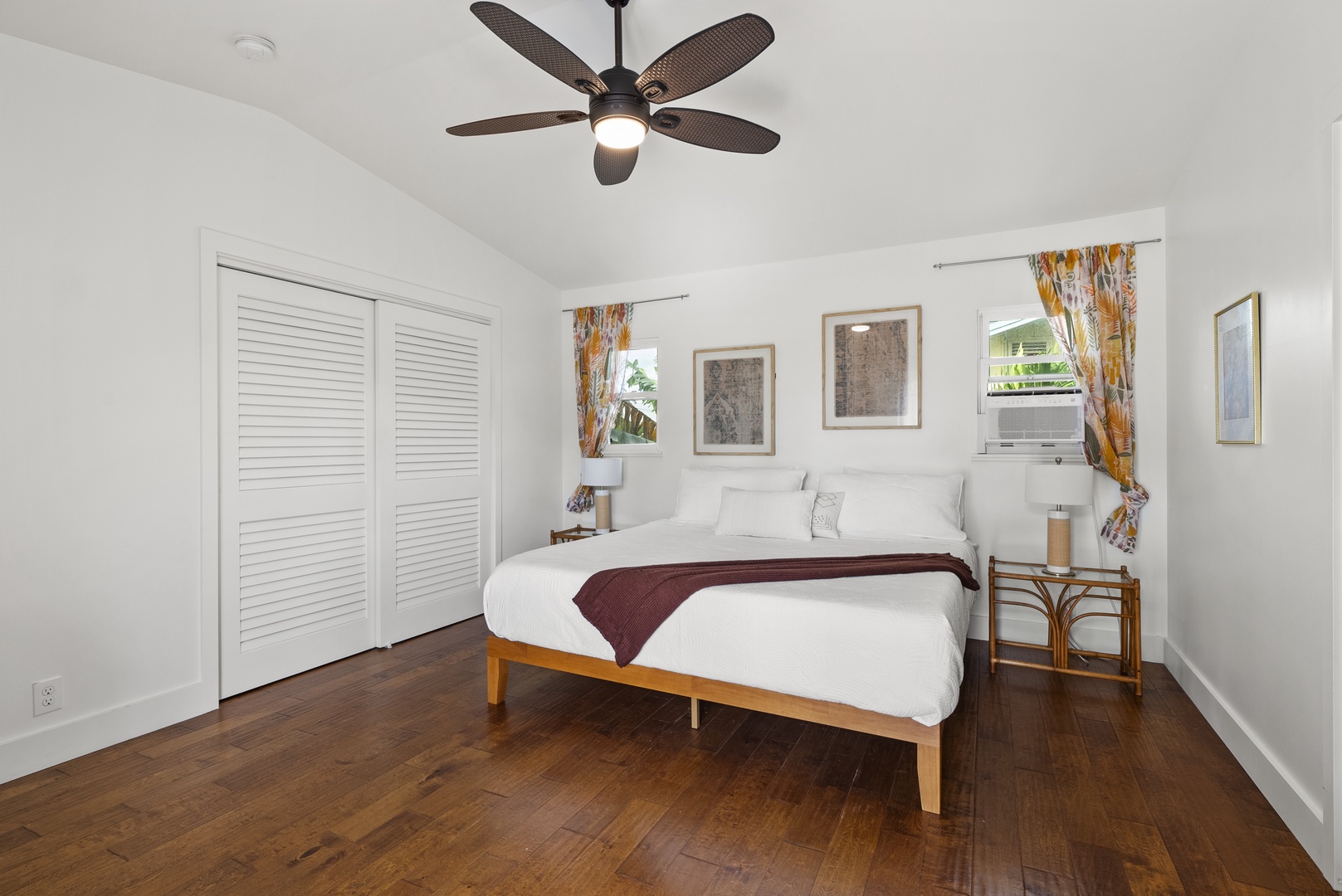 Kaaawa Vacation Rentals, Ka'a'awa Hale - Comfortable bedroom with simple, modern decor and plenty of natural light.