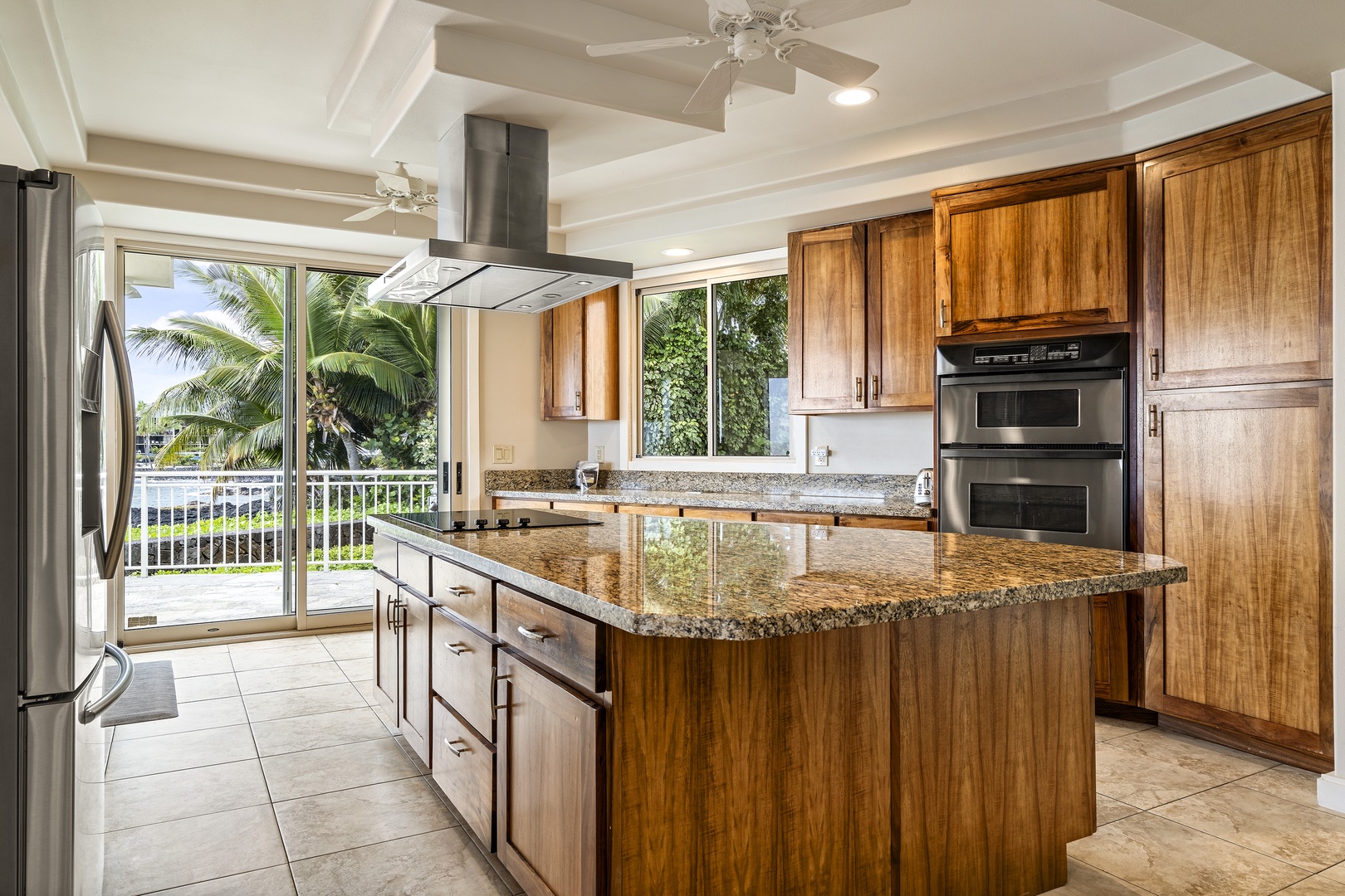 Kailua Kona Vacation Rentals, Ali'i Point #12 - Upgraded kitchen with stainless steel appliances, granite countertops, and high-end touches—perfect for group cooking.
