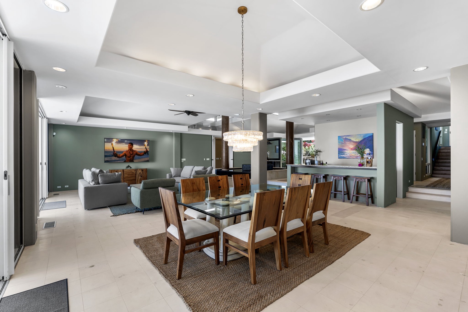Kailua Kona Vacation Rentals, Hale Nai'a - Gather around this stunning dining table where memorable meals unfold beneath designer lighting, seamlessly connecting to your spacious living area.