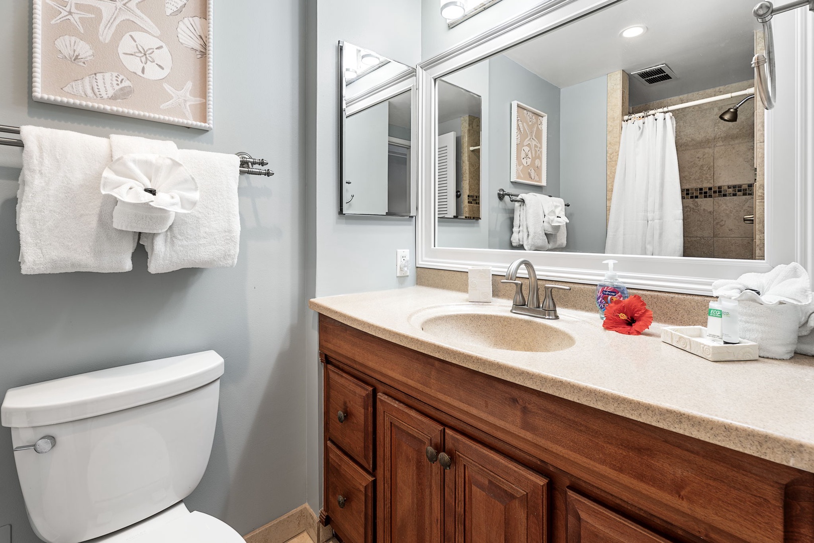 Kailua Kona Vacation Rentals, Sea Village 1105 - Second full bathroom features a wide vanity and bright lighting—ideal for getting ready or winding down.