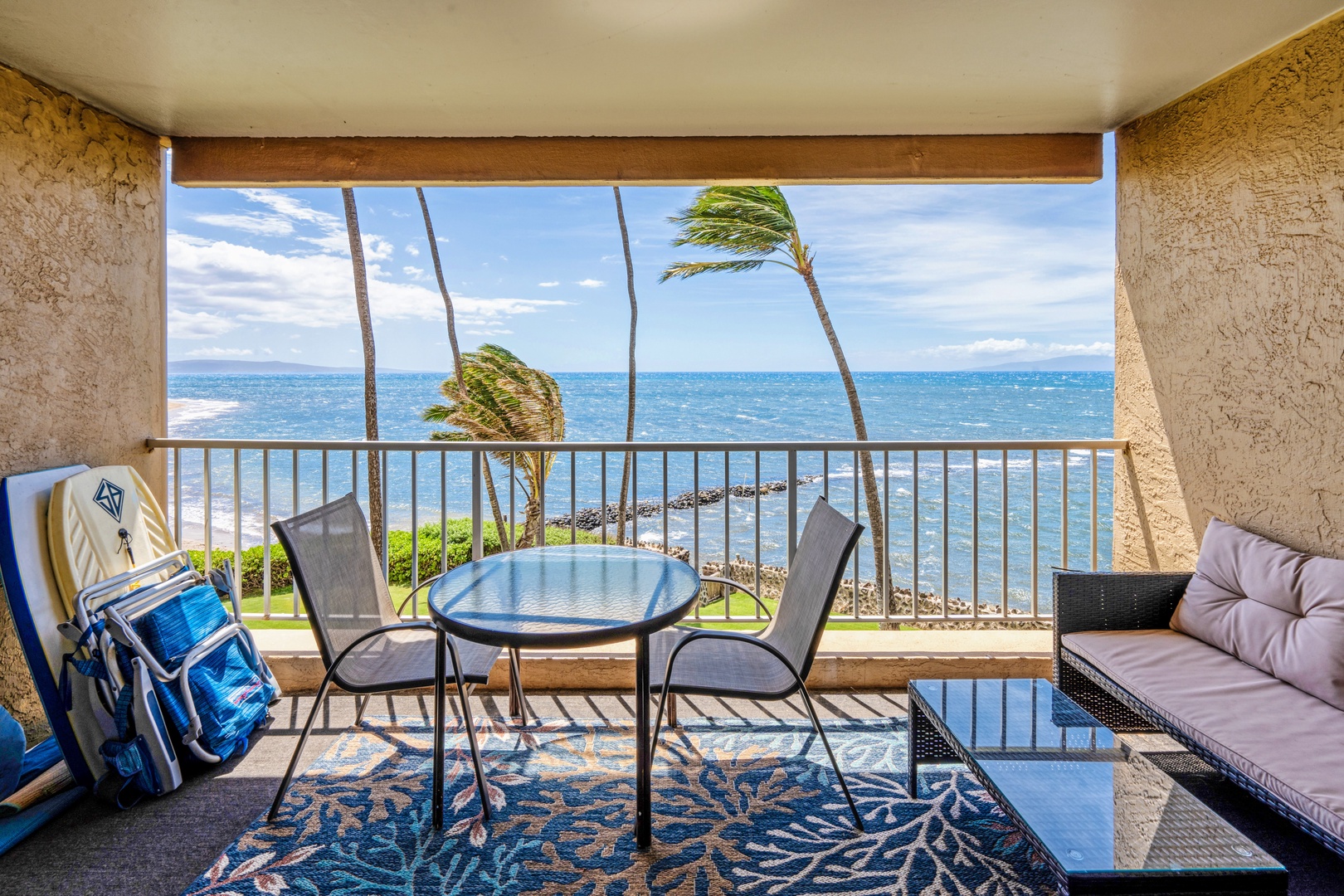 Kihei Vacation Rentals, Menehune Shores 316 - Boogie boards and beach chairs lean by the door, already packed for the next low tide.