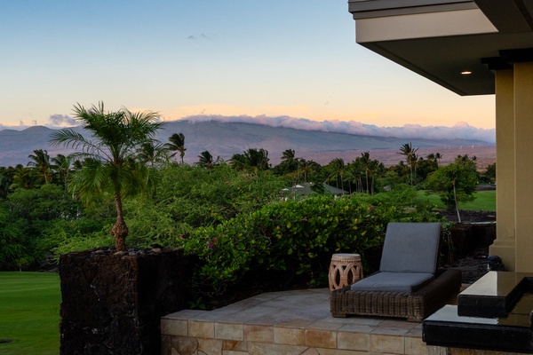 Kamuela Vacation Rentals, Canoe House & Beach Walker at Champion Ridge - Lounge area with stunning mountain views at sunset, providing a peaceful spot to unwind.