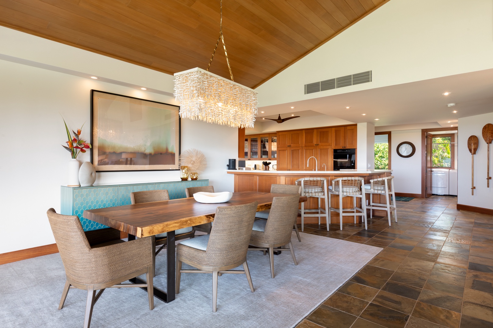 Kailua Kona Vacation Rentals, 3BD Waiulu Villa (111D) at Hualalai Resort - Stunning dining area with a table seating six, opening to breathtaking outdoor views.