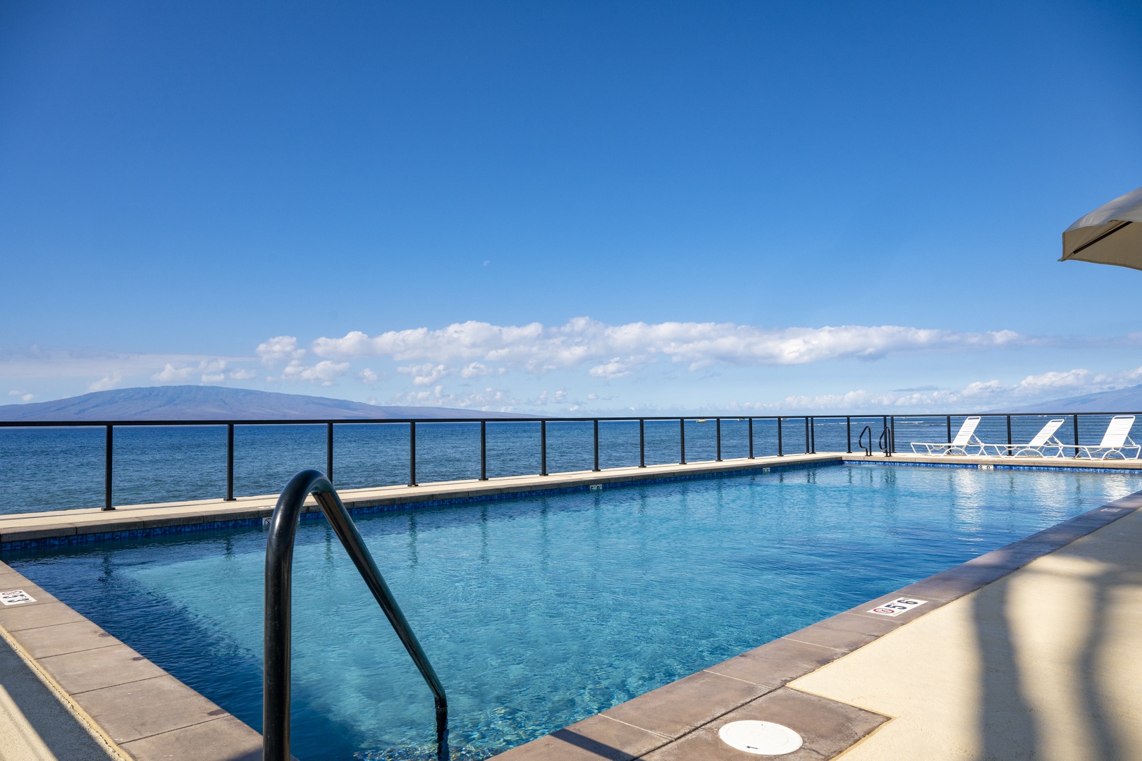 Lahaina Vacation Rentals, Puamana 240-3 - Watch the surf roll in as you unwind in Puamana’s signature waterfront pool.