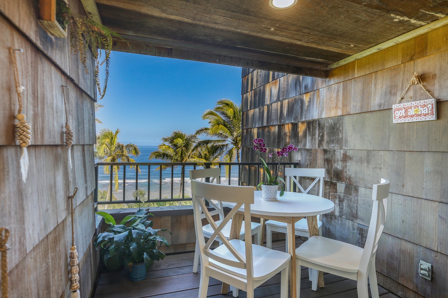 Princeville Vacation Rentals, Sealodge J8 - Your private balcony has an outdoor dining area with seating for 4 and expansive ocean views