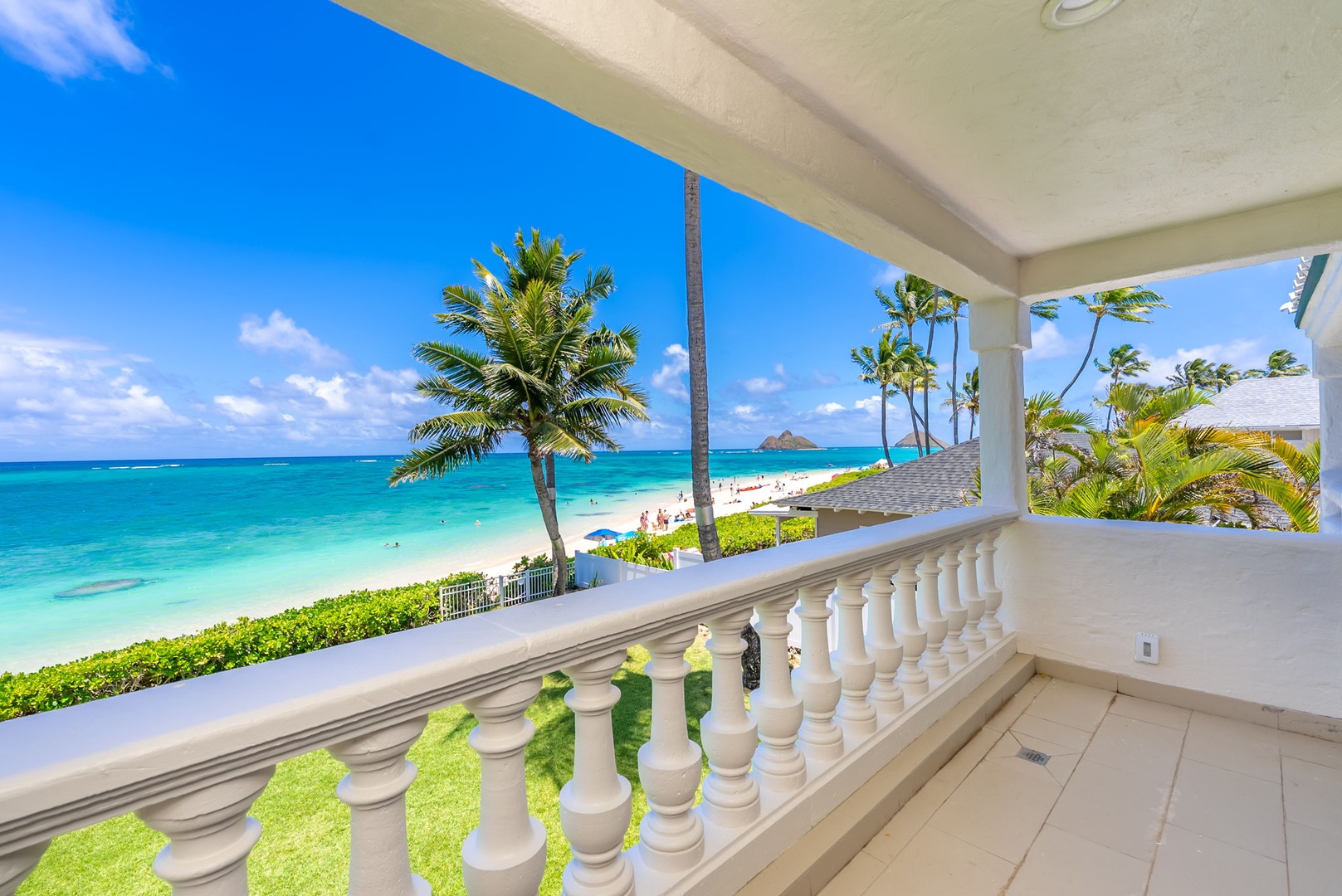 Kailua Vacation Rentals, Lanikai Sunrise Estate - Breathe in the ocean breeze from your shaded lanai, just off the guest suite with panoramic beach views.