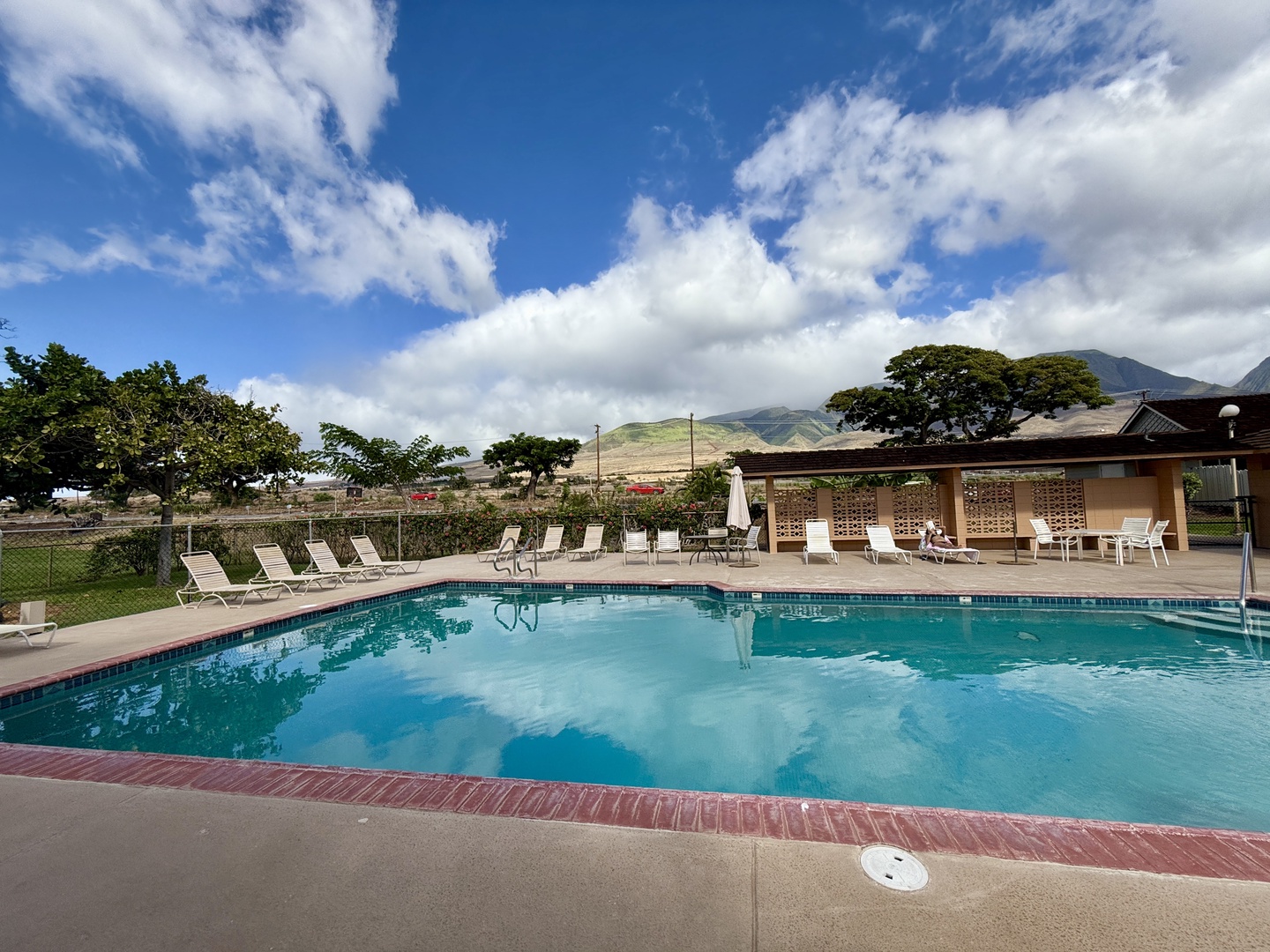 Lahaina Vacation Rentals, Puamana 254-2 - The dolphin pool with plenty of lounge chairs for a relaxing day in the sun.