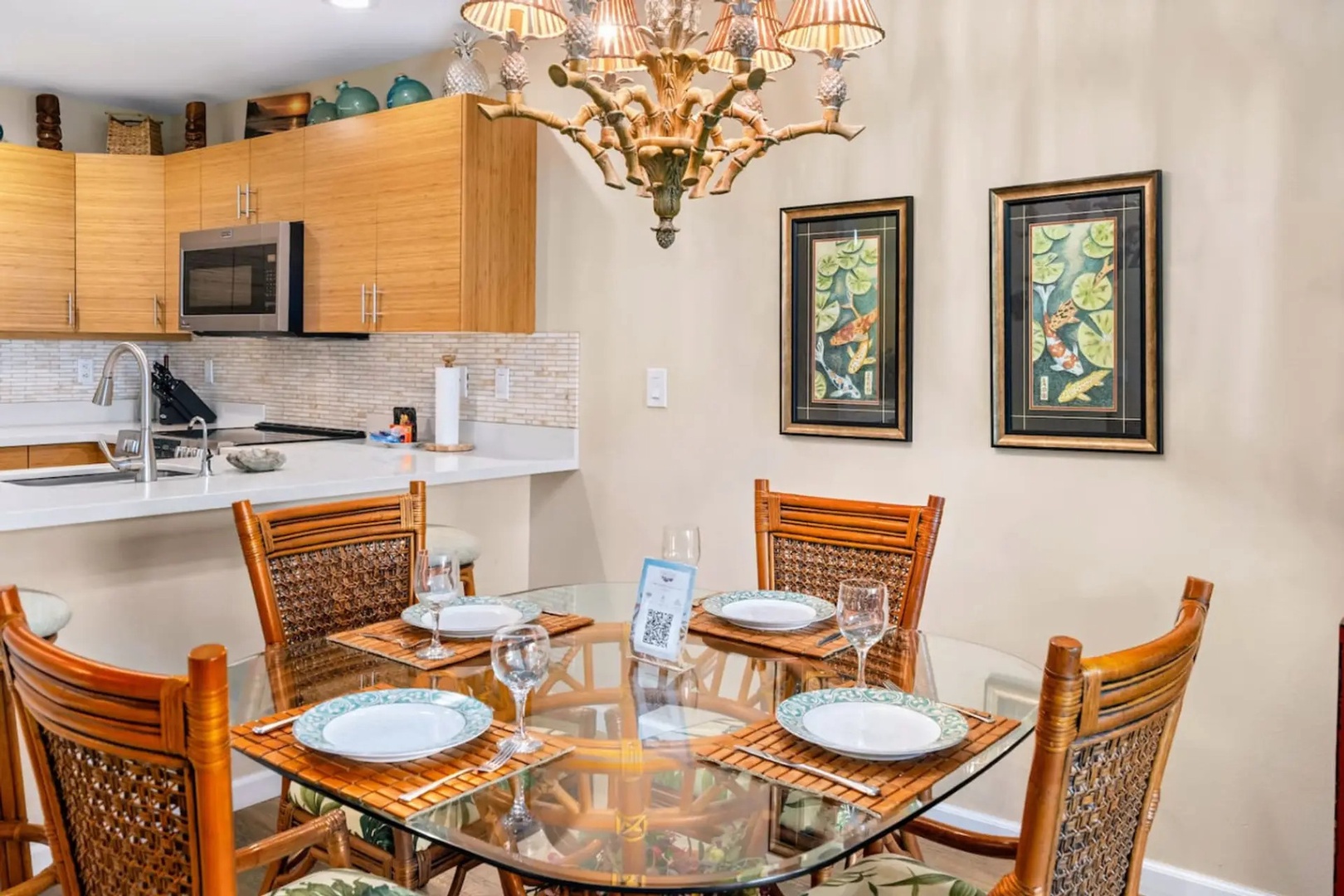 Kihei Vacation Rentals, Maui Kamaole E103 - Walk in to a table already set for four, welcome card included.