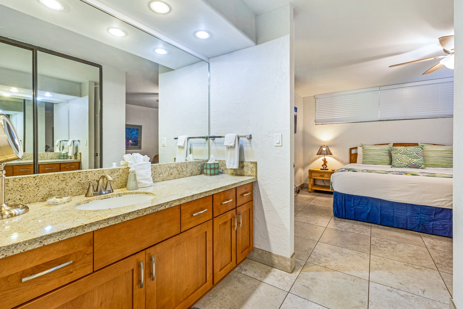 Lahaina Vacation Rentals, Papakea K-105 - The ensuite bathroom offers a spacious vanity with plenty of counter space and is conveniently located next to the bedroom