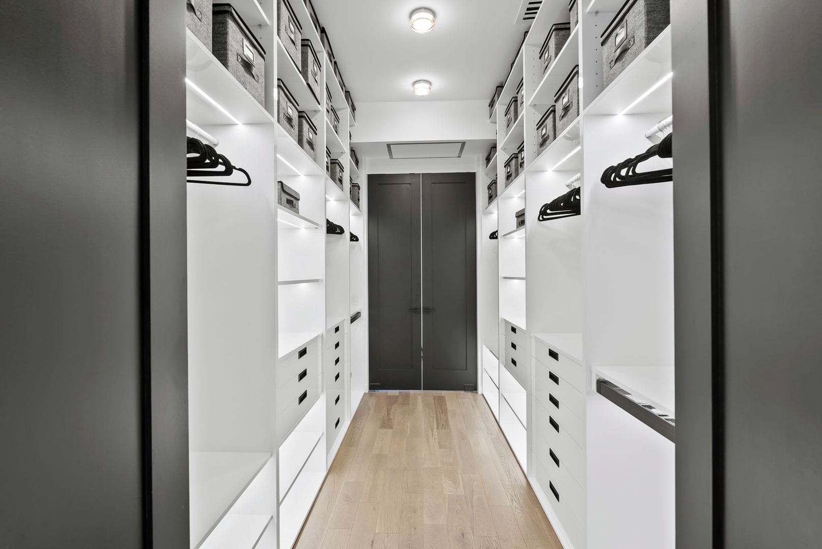 Honolulu Vacation Rentals, Ocean Villa Emilie - A custom walk-in wardrobe with built-in lighting and storage offers a luxury boutique feel for extended stays.