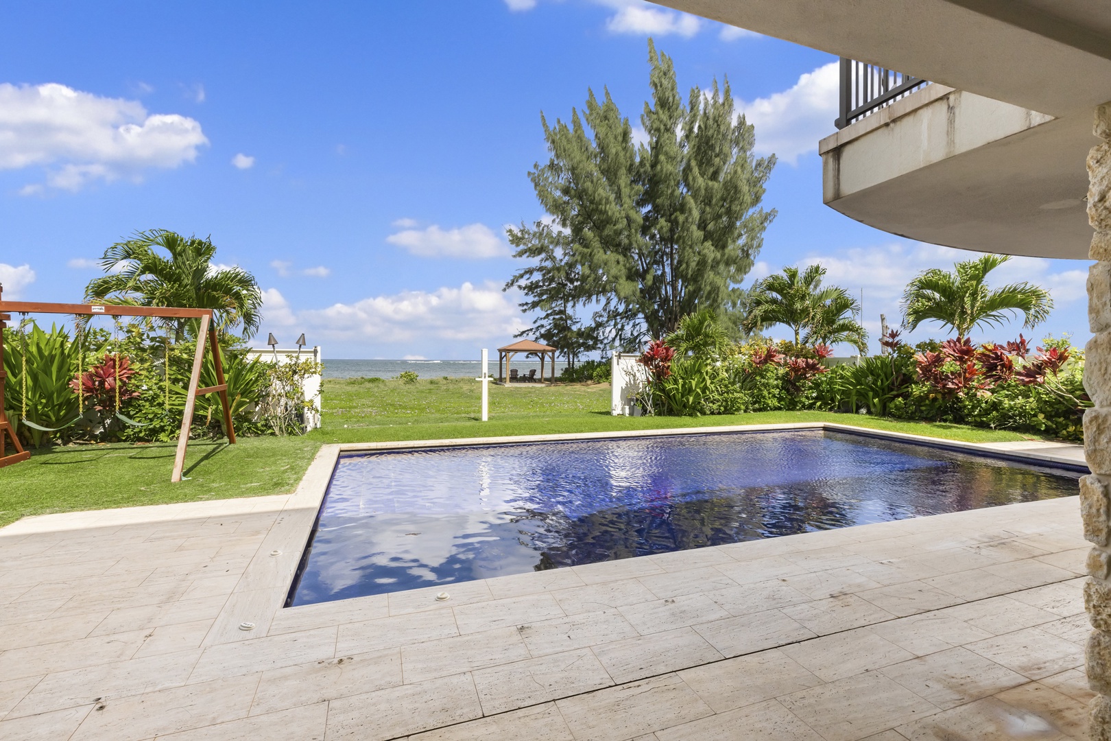 Waialua Vacation Rentals, Waialua Beachfront Getaway - Pool looking out onto the ocean.