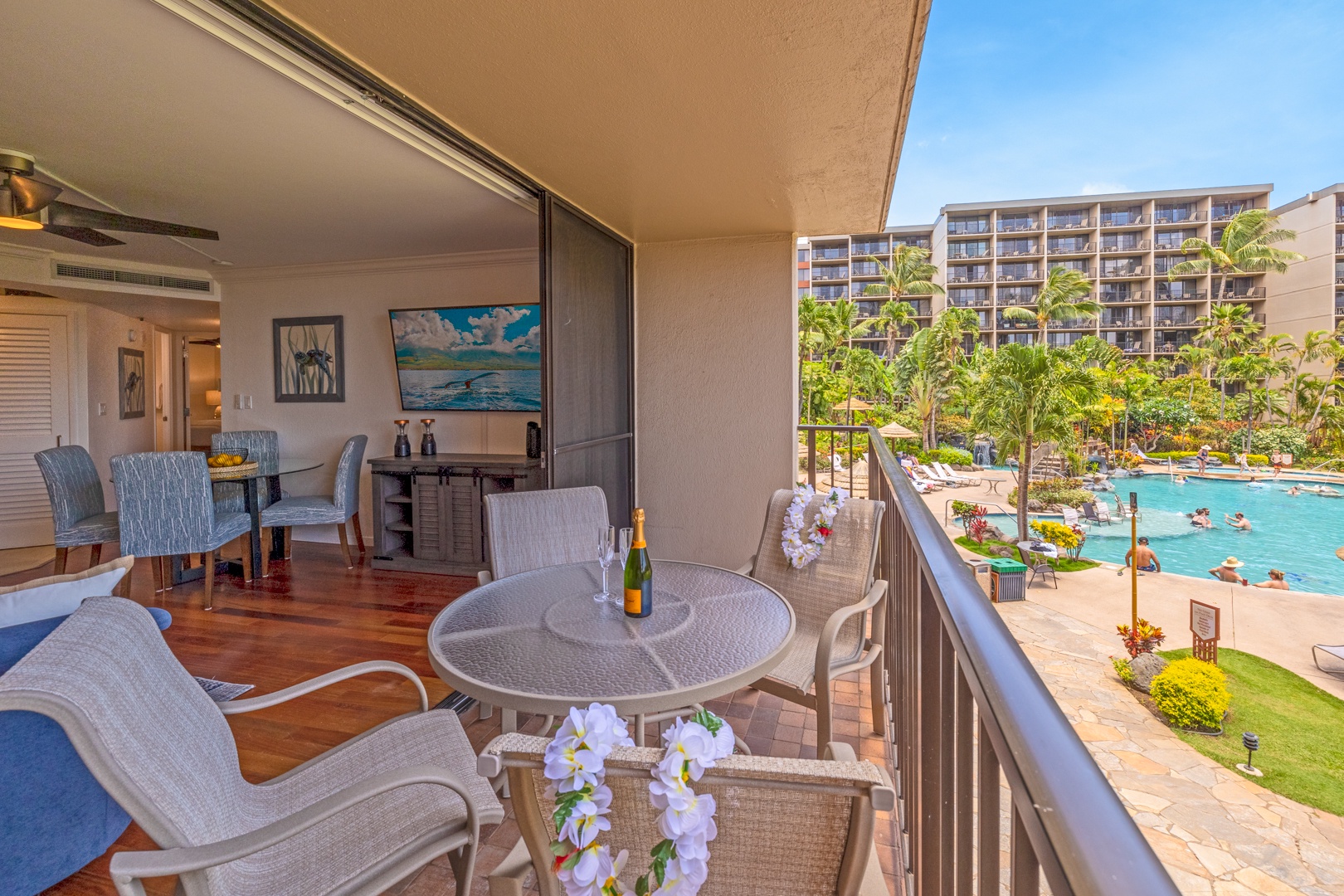 Lahaina Vacation Rentals, Kaanapali Shores 213 - The private lanai offers a cozy outdoor seating area, perfect for enjoying meals or drinks while taking in the beautiful tropical views and fresh air.