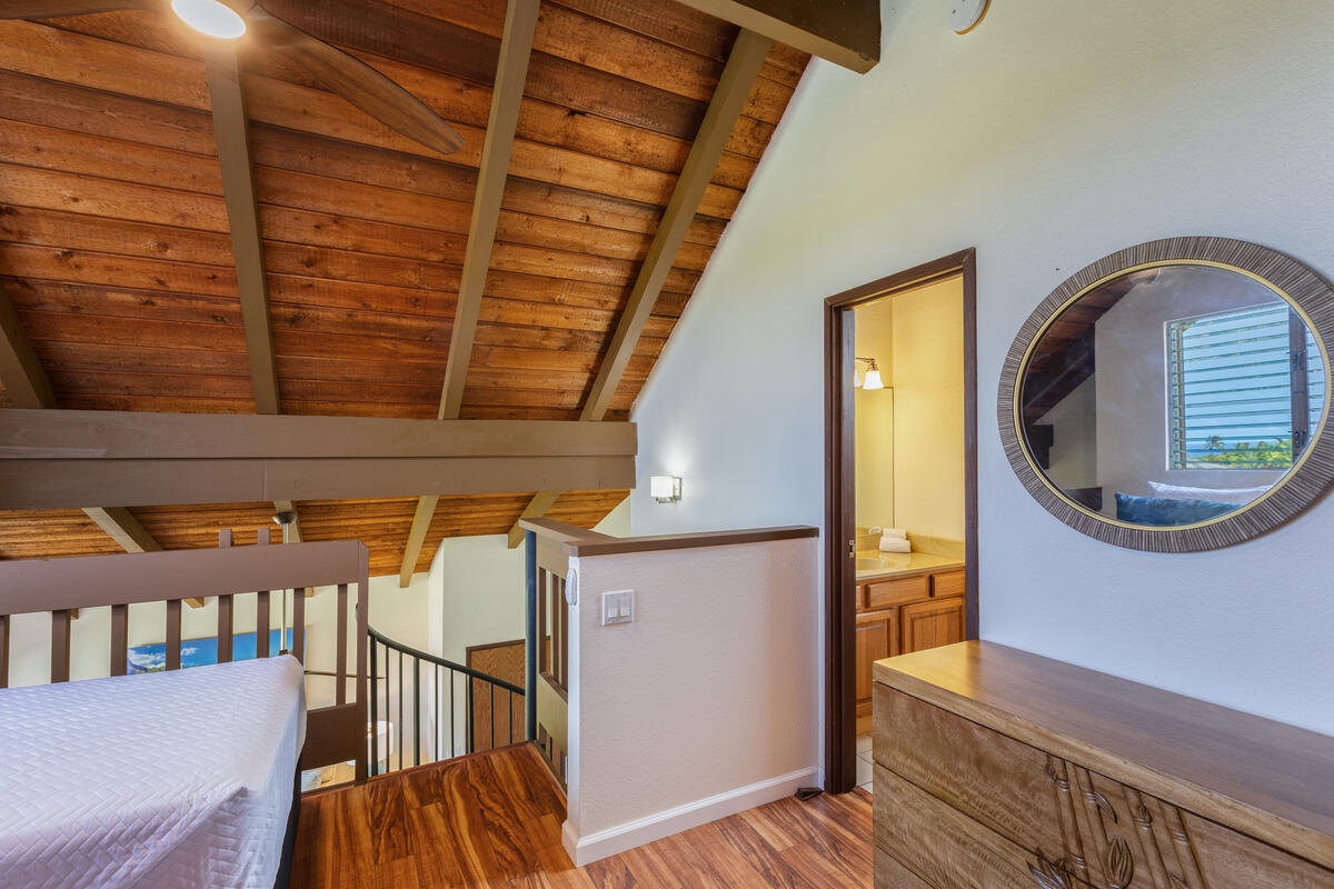 Princeville Vacation Rentals, Hale Ohana Ho'omaka - View of the upper-level loft with half bath access. A versatile space for extra guests or kids.