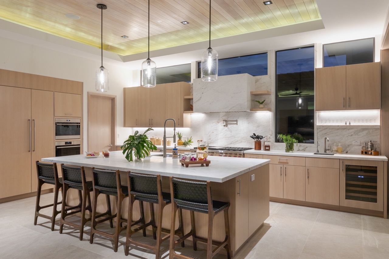 Waimea Vacation Rentals, 5BD Mauna Lani Lux Golf Estate (4) at One Ocean - This gourmet kitchen is thoughtfully designed for both functionality and style, featuring a spacious island with bar seating that encourages social cooking and dining experiences