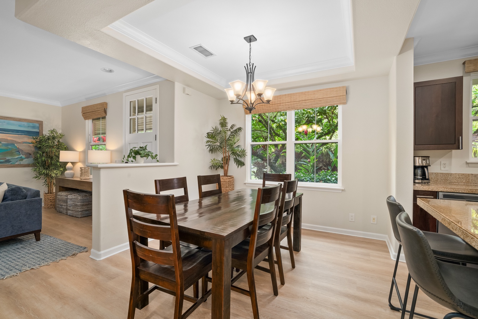 Princeville Vacation Rentals, Hale Kaua'i - Share memorable meals in this inviting dining space filled with warm natural light.