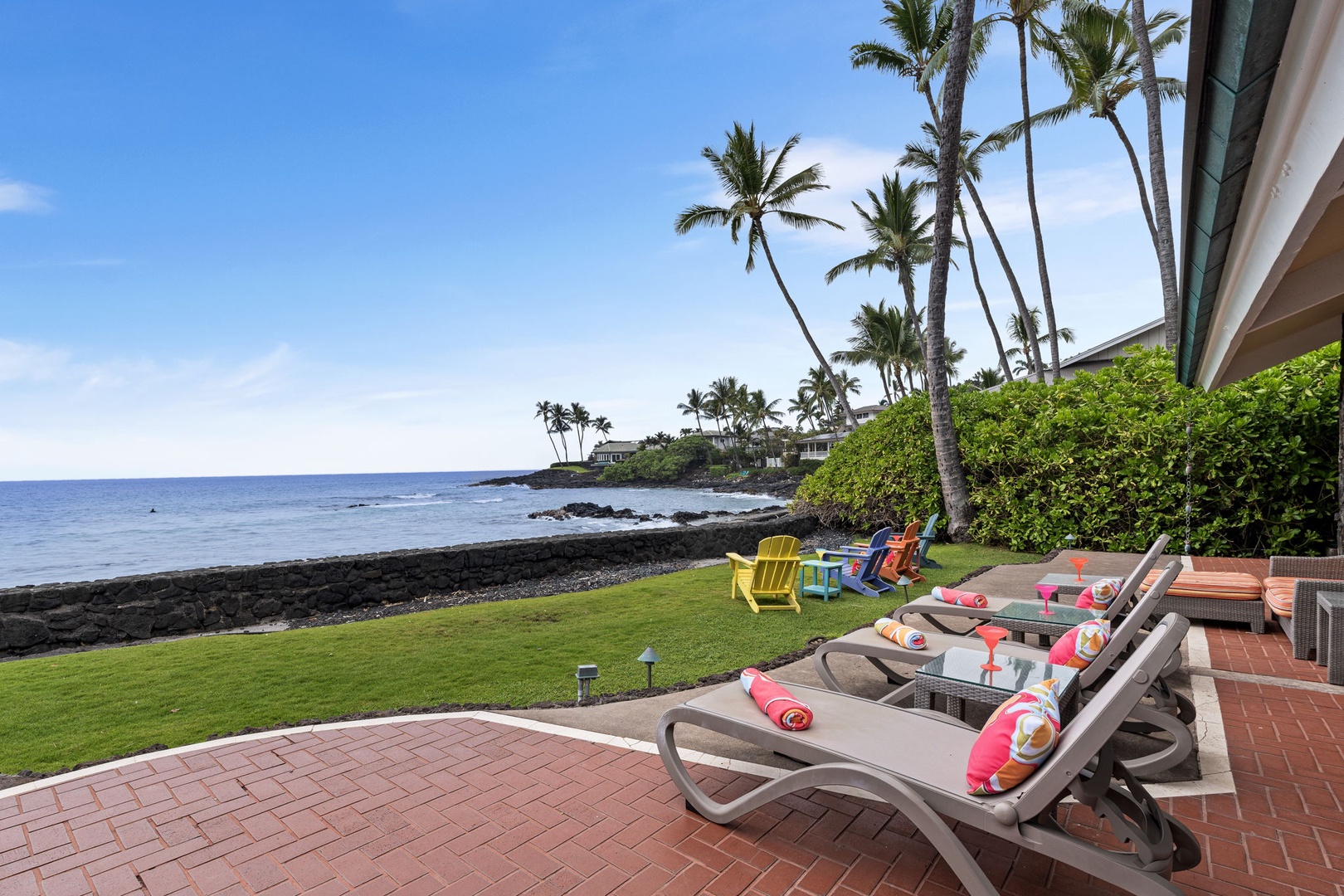 Kailua Kona Vacation Rentals, Hale Pua - Lounge oceanside, where palms sway and the shoreline is just steps away.