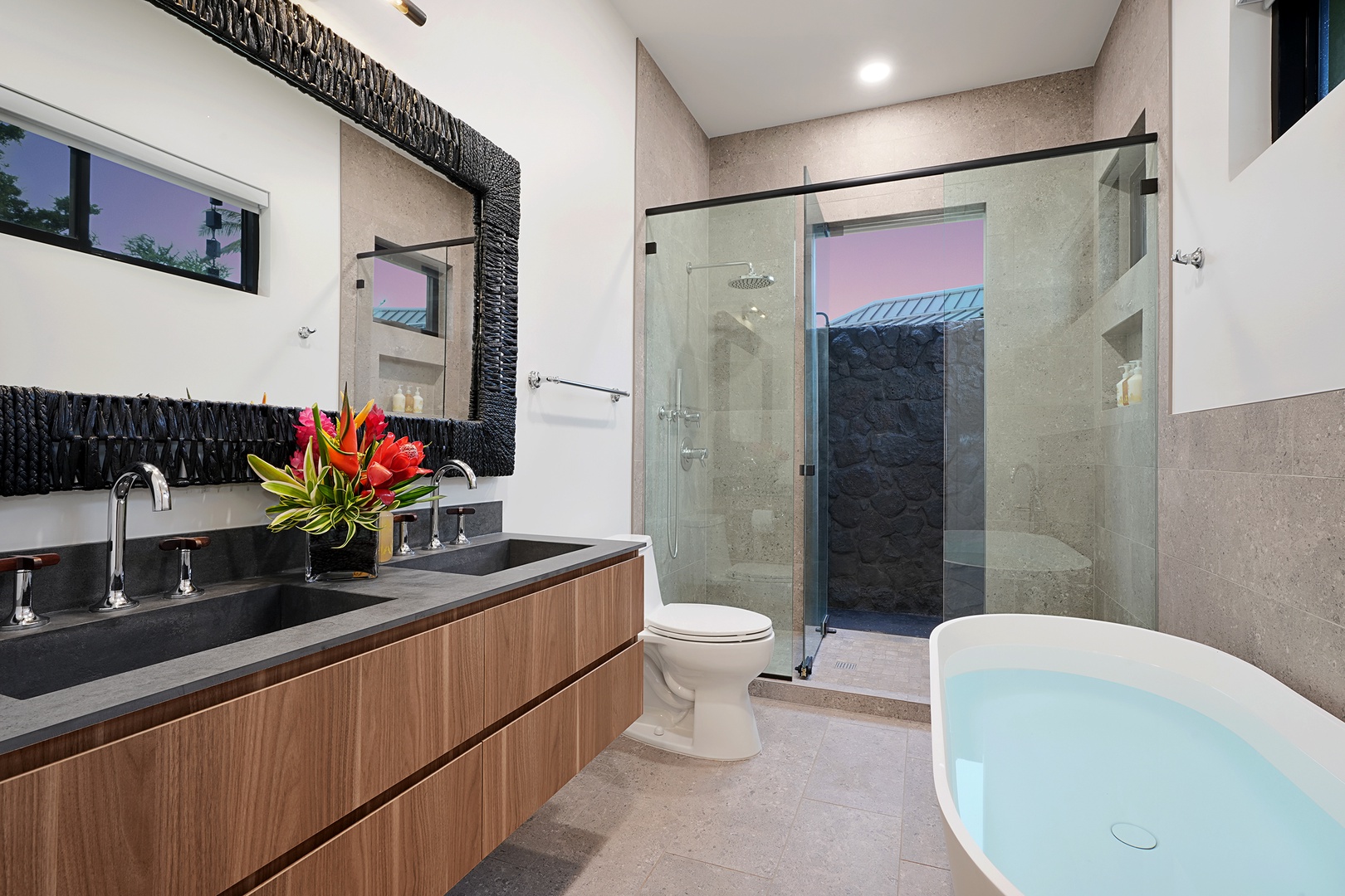 Koloa Vacation Rentals, Ka Hui Ana at Kukuiula - Luxurious primary en suite with a spa-like ambiance, complete with a large soaking tub and a separate walk-in shower.