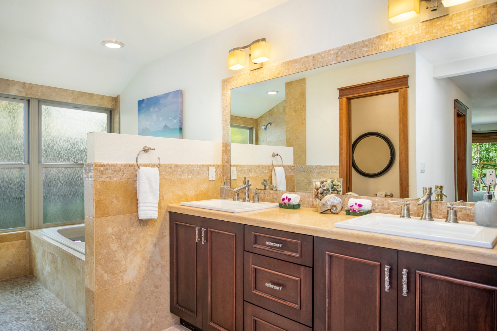 Honolulu Vacation Rentals, Hale Niuiki - Primary en-suite bathroom with dual sink and wide vanity space.