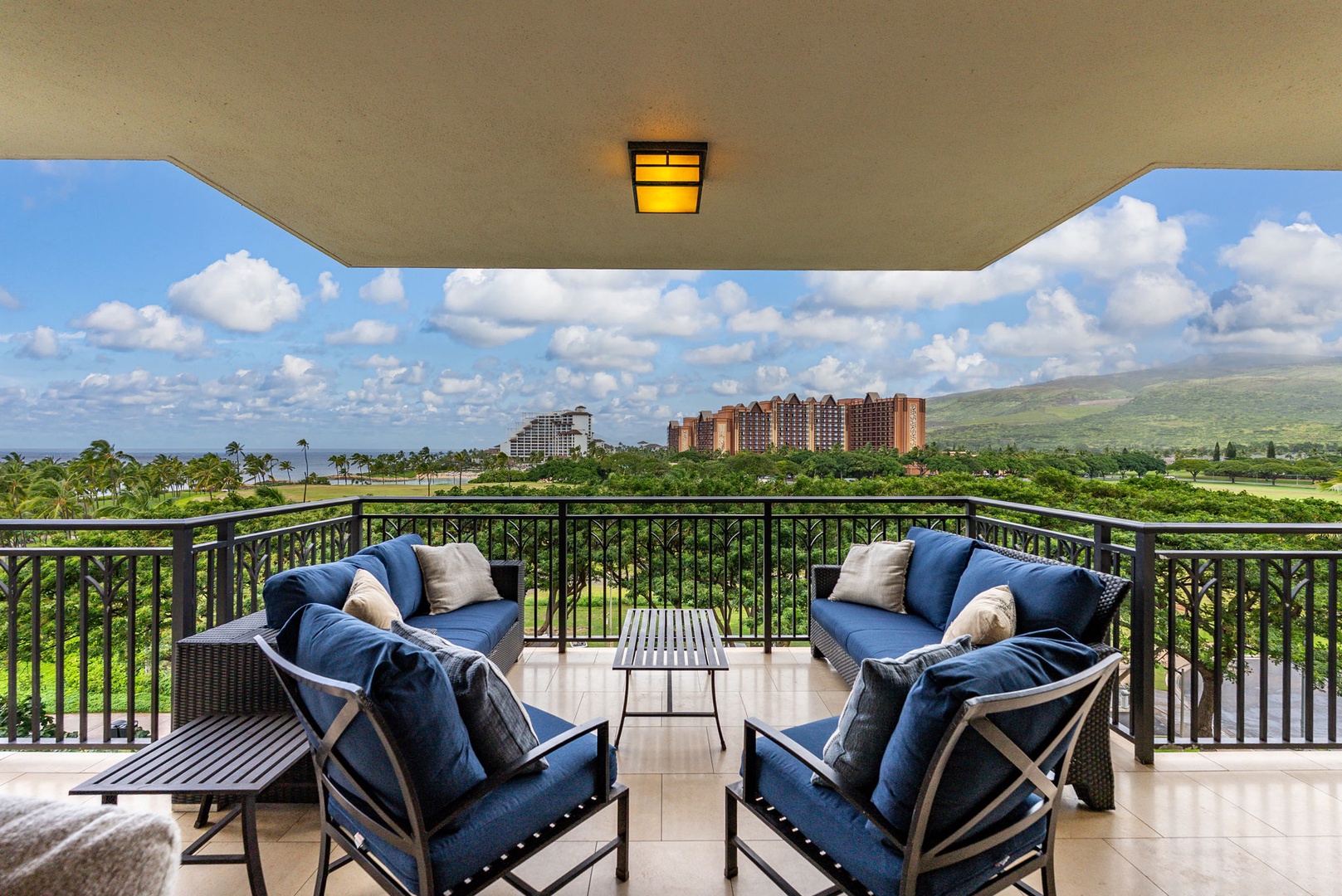 Kapolei Vacation Rentals, Ko Olina Beach Villas B604 - Unwind on your private covered balcony with stunning mountain and tropical views stretching to the horizon.