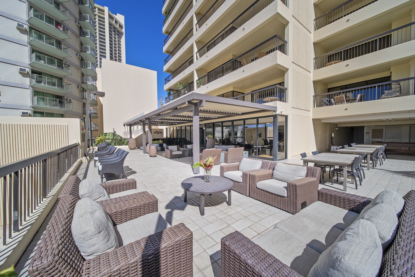 Honolulu Vacation Rentals, Aston Waikiki Beach Tower 602 - Lounge in the outdoor seating area, ideal for enjoying balmy evenings with friends.