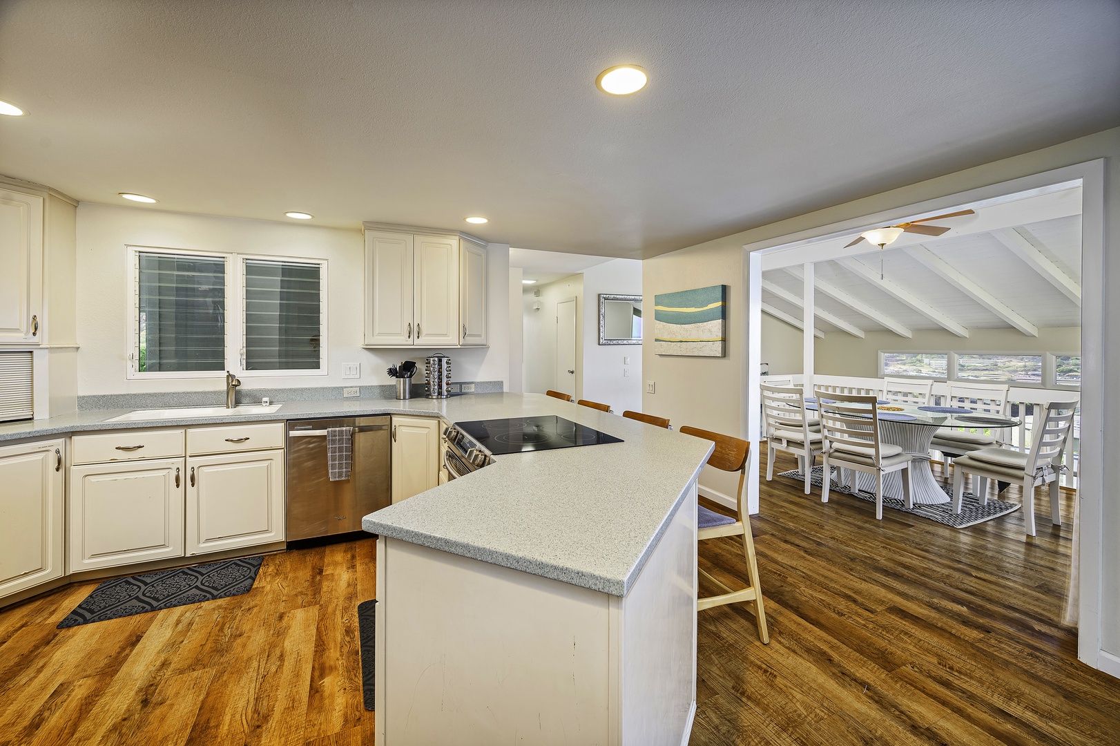 Honolulu Vacation Rentals, Hale Malia - The kitchen opens up to the indoor dining area on the upper level