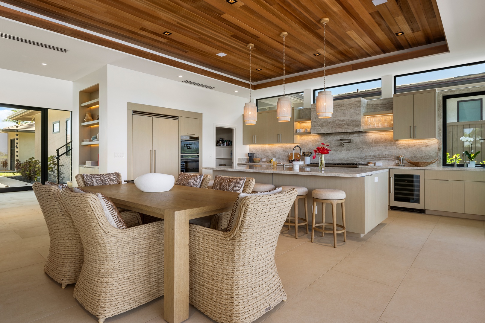 Kamuela Vacation Rentals, 6BD Mauna Lani Lux Golf Estate (5) at One Ocean - The open-concept kitchen and dining area offers a seamless welcome from the entry.