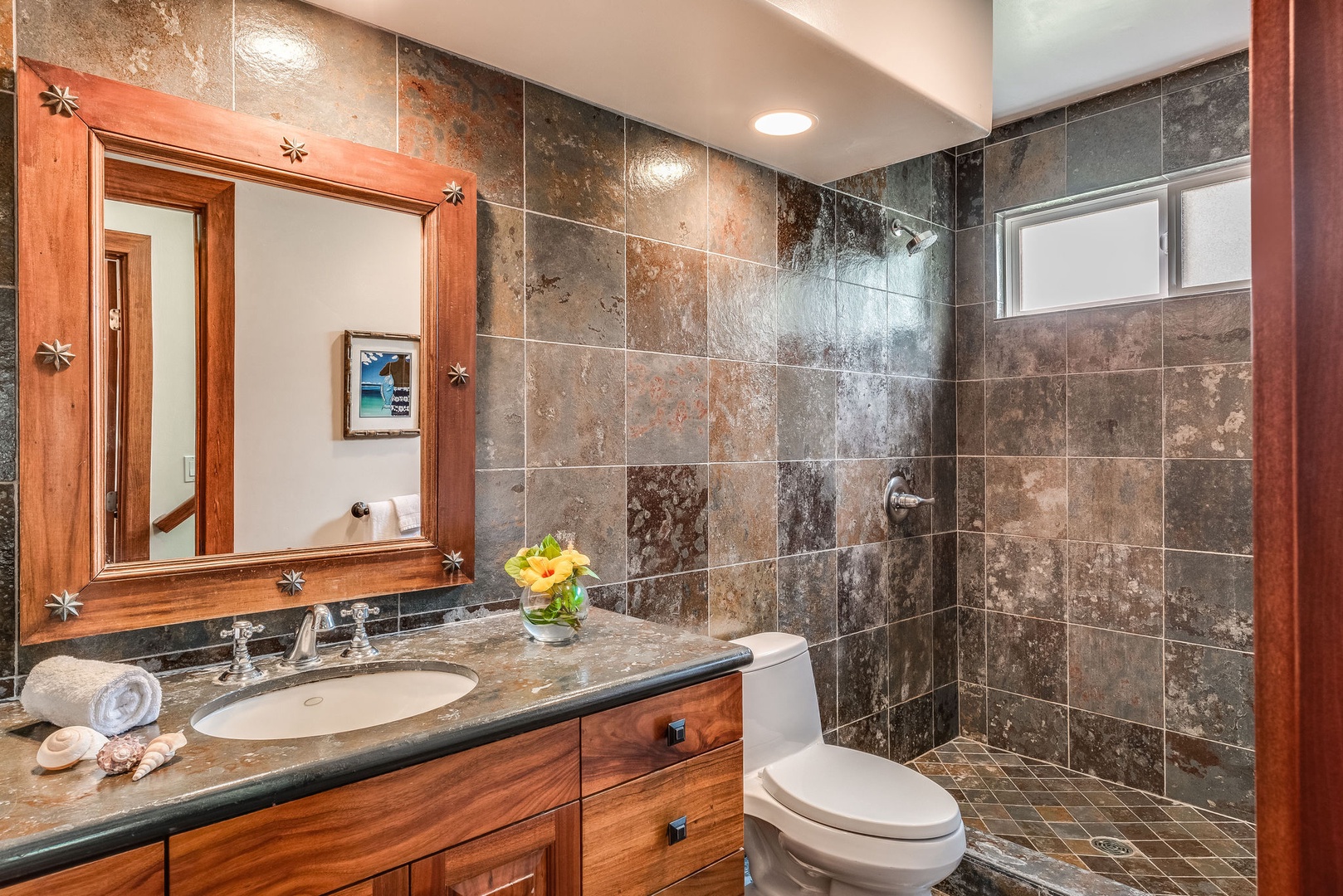 Kailua Kona Vacation Rentals, Kona Beach Bungalows** - Moana Hale downstairs bathroom with a walk-in shower