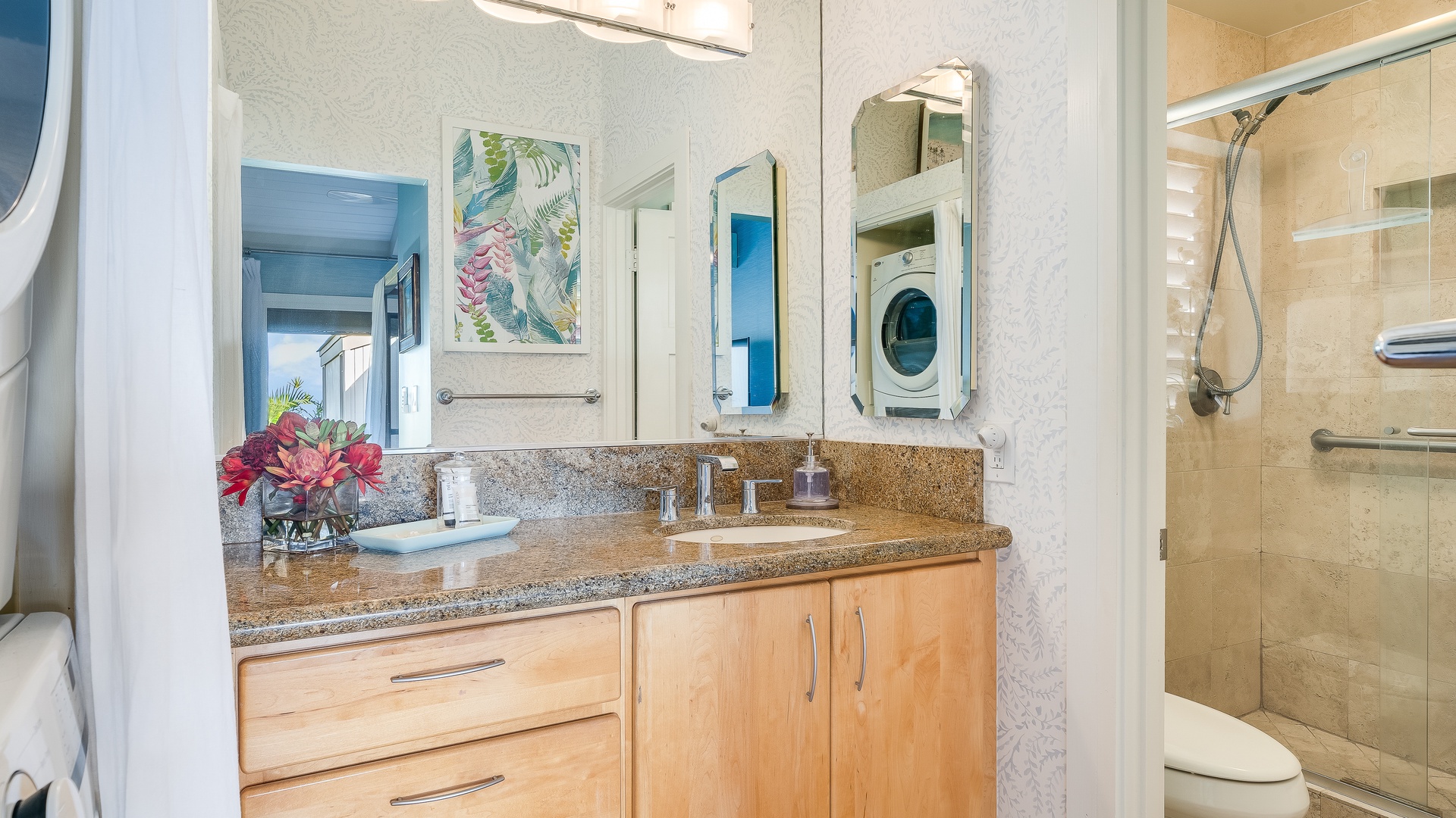 Kihei Vacation Rentals, Wailea Ekolu 1106 - This bathroom offers a spacious vanity with ample storage and sleek fixtures, perfect for a comfortable stay.